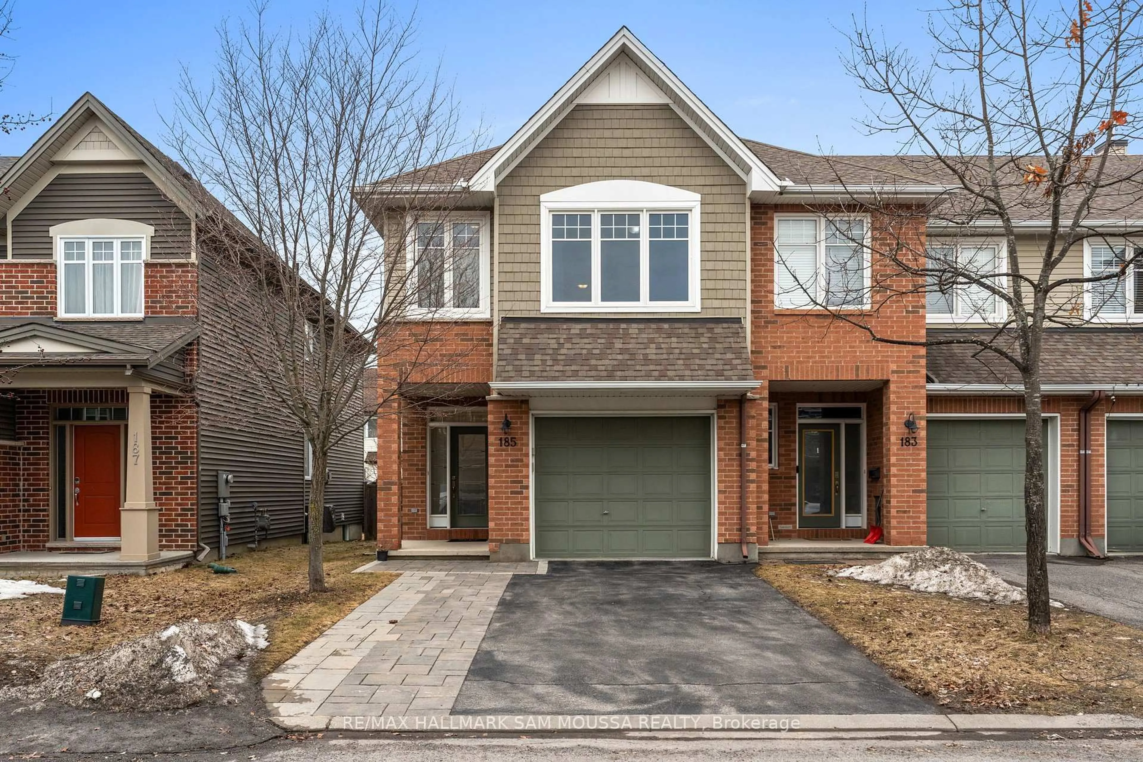 Home with brick exterior material, street for 185 Flat Sedge Cres, Ottawa Ontario K1T 0G9