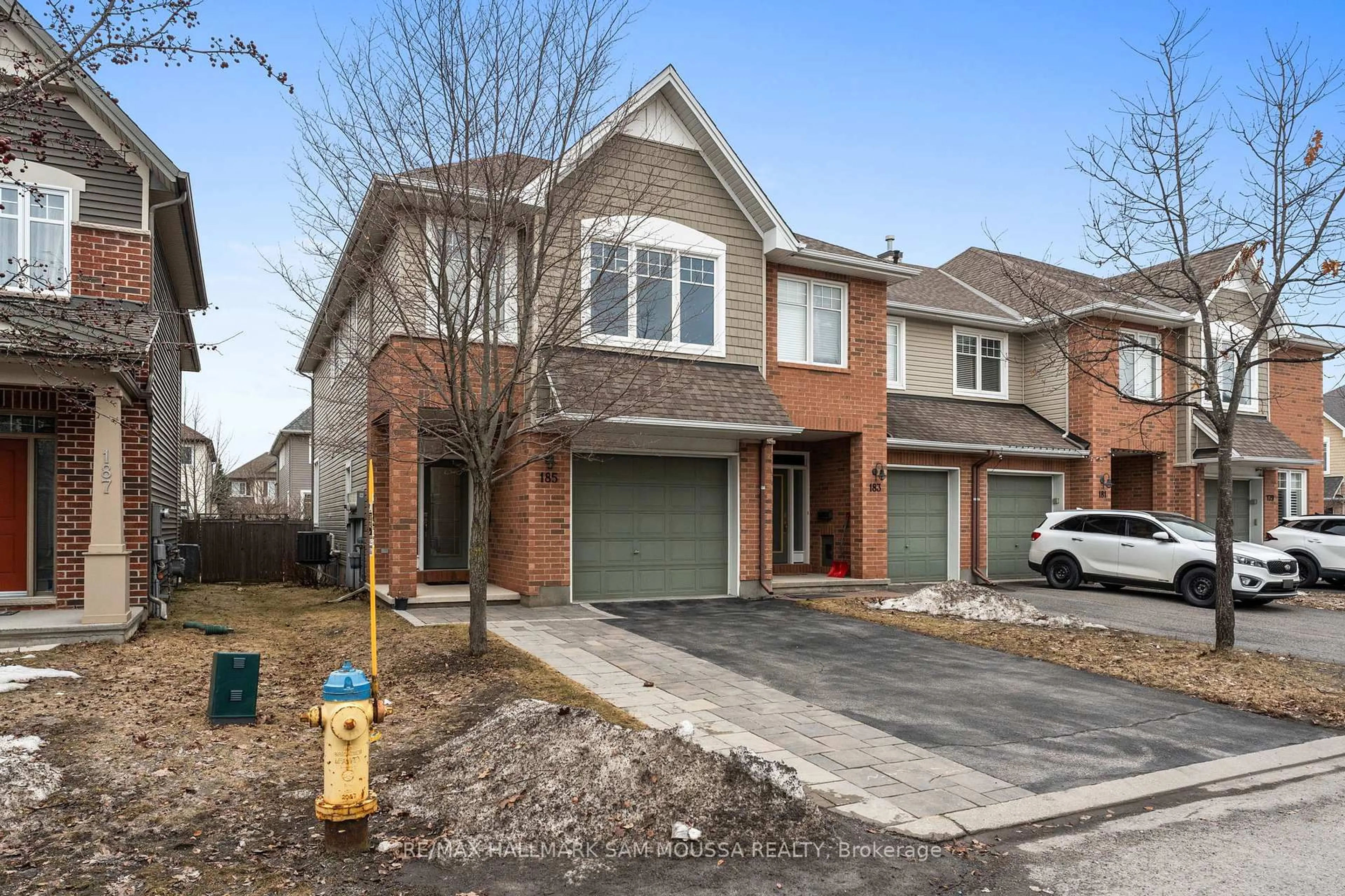 Home with brick exterior material, street for 185 Flat Sedge Cres, Ottawa Ontario K1T 0G9