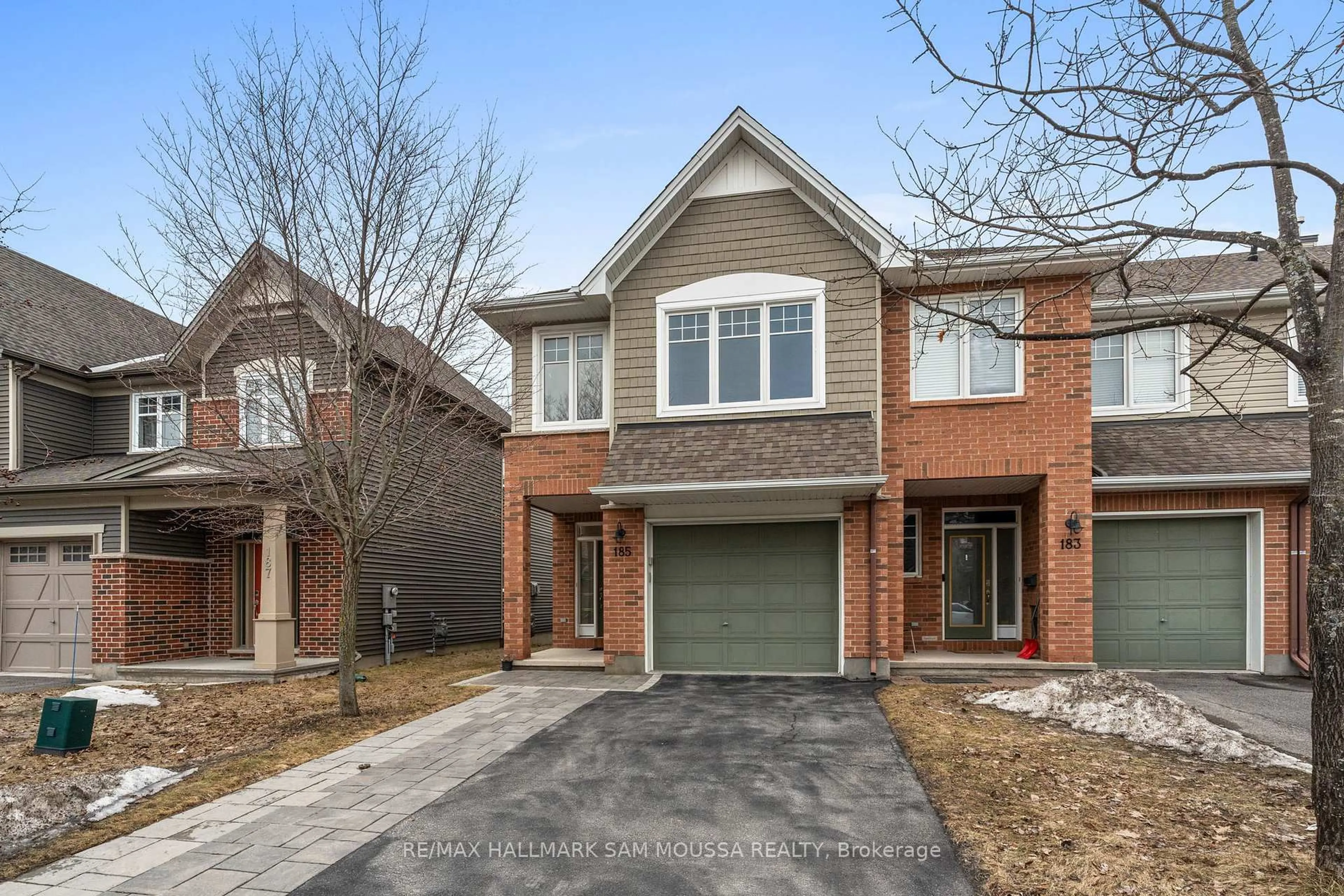 Home with brick exterior material, street for 185 Flat Sedge Cres, Ottawa Ontario K1T 0G9