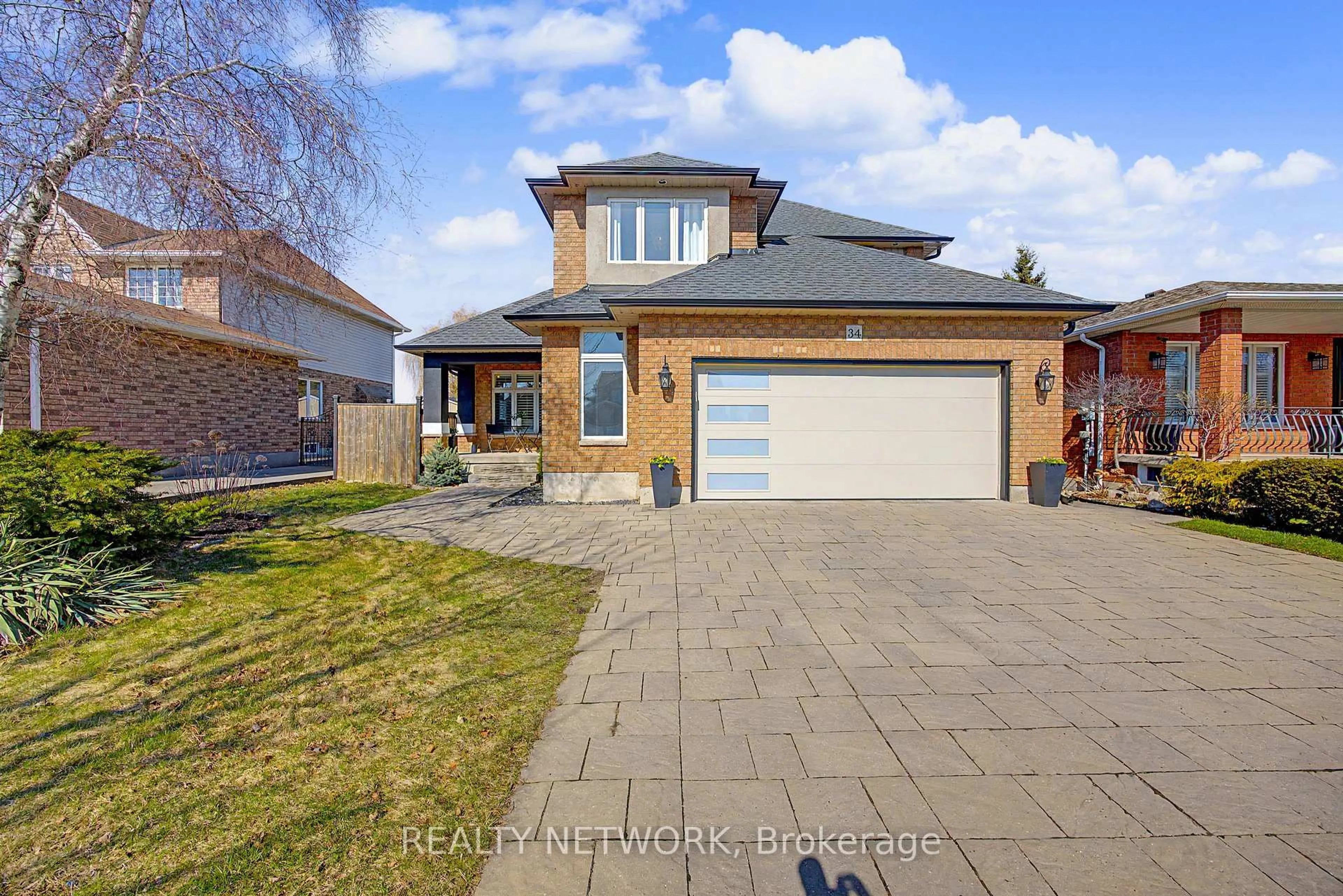 Home with brick exterior material, street for 34 Highbury Dr, Hamilton Ontario L8J 2T4