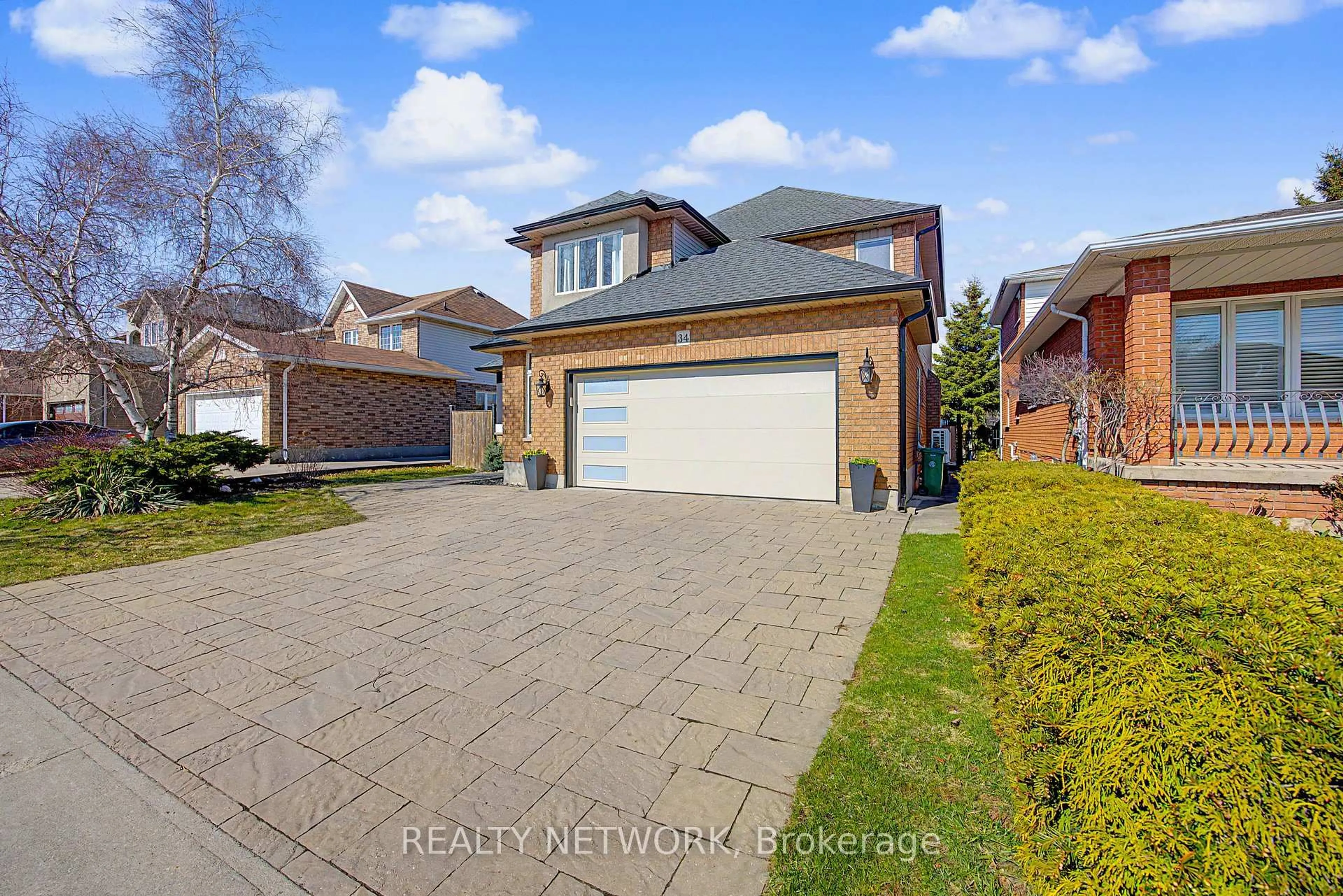 Home with brick exterior material, street for 34 Highbury Dr, Hamilton Ontario L8J 2T4