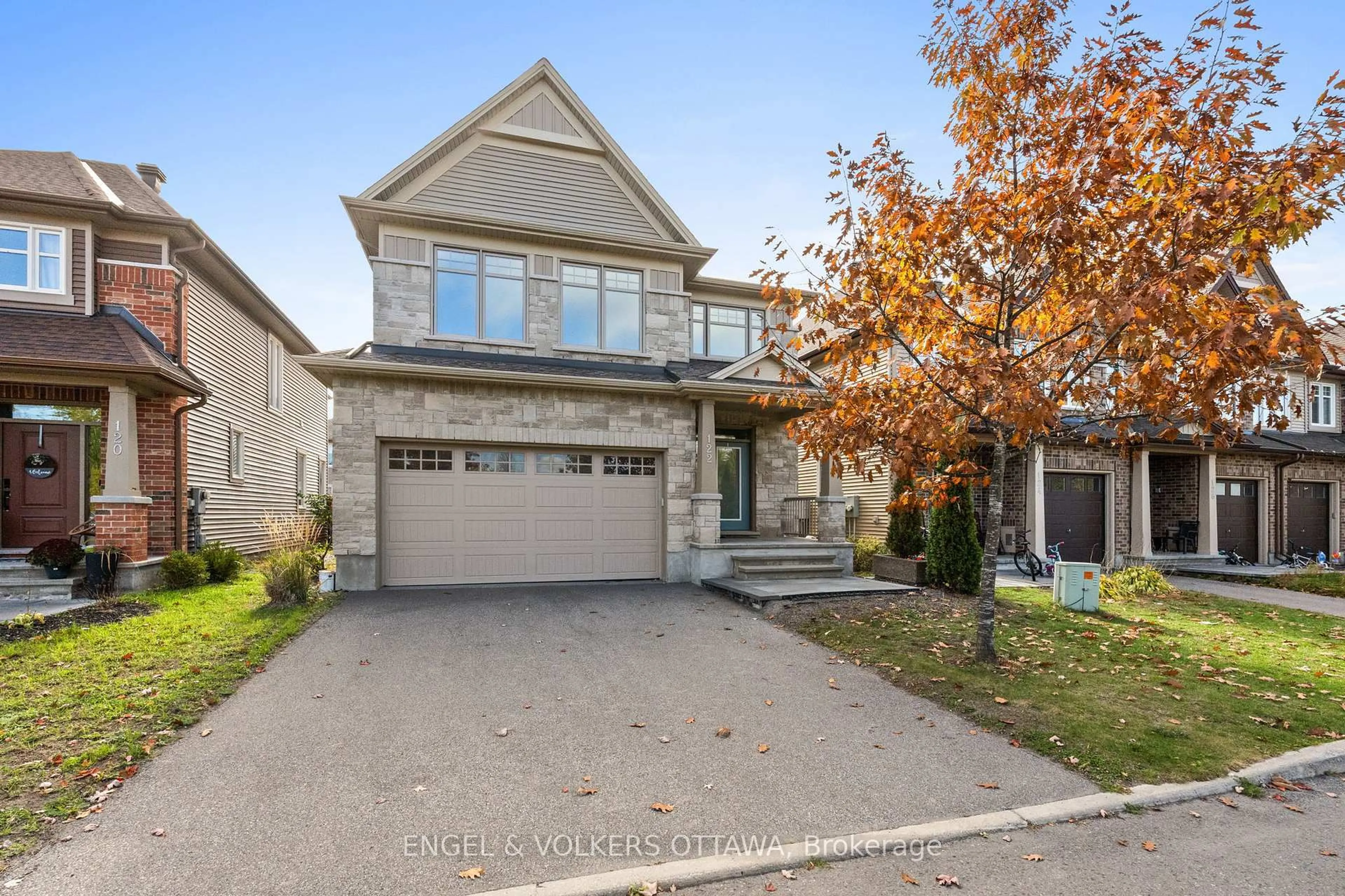 Home with brick exterior material, street for 122 Helen Rapp Way, Ottawa Ontario K1T 0N4