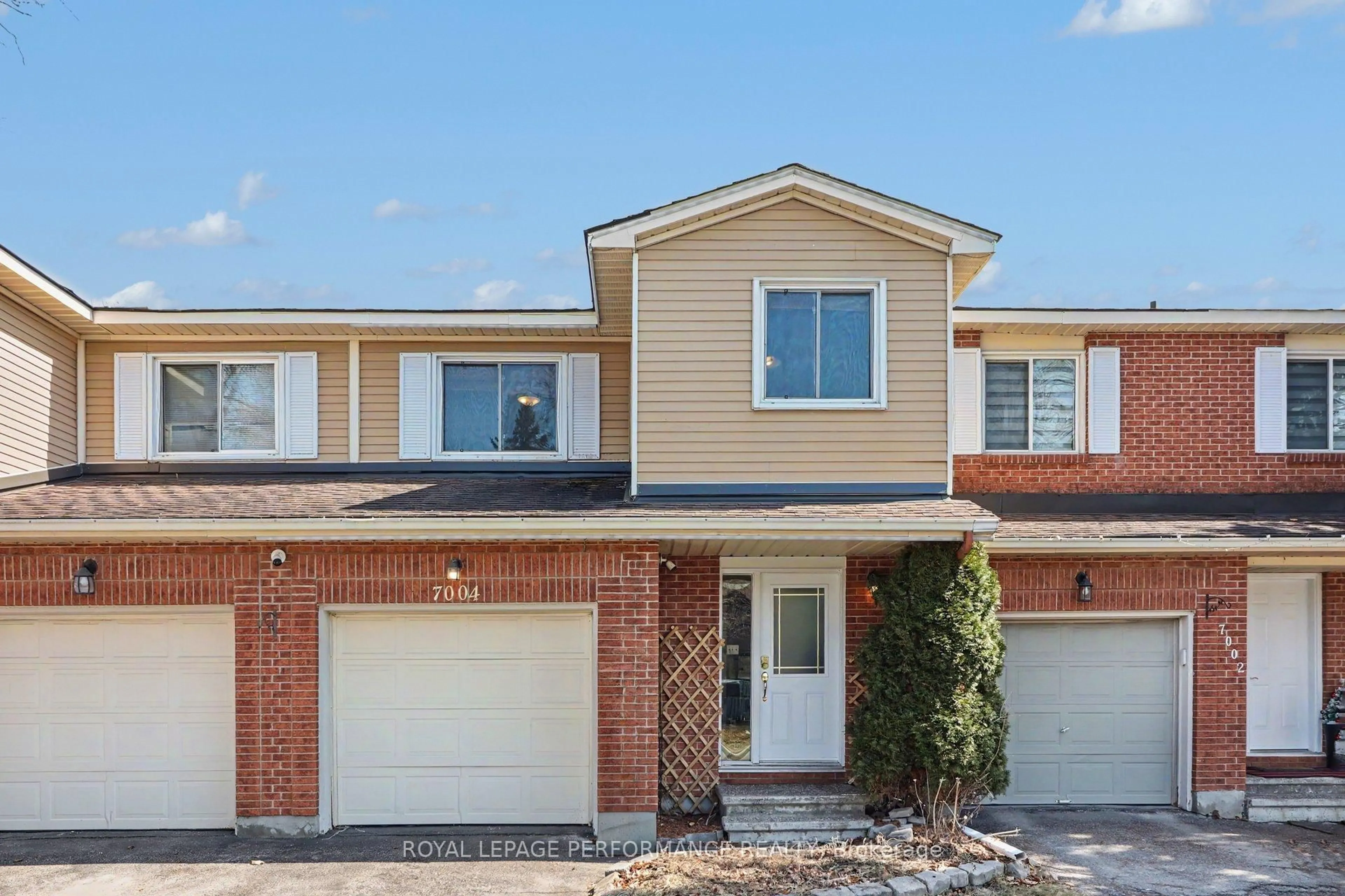 Home with brick exterior material, street for 7004 Bilberry Dr, Ottawa Ontario K1C 3R6