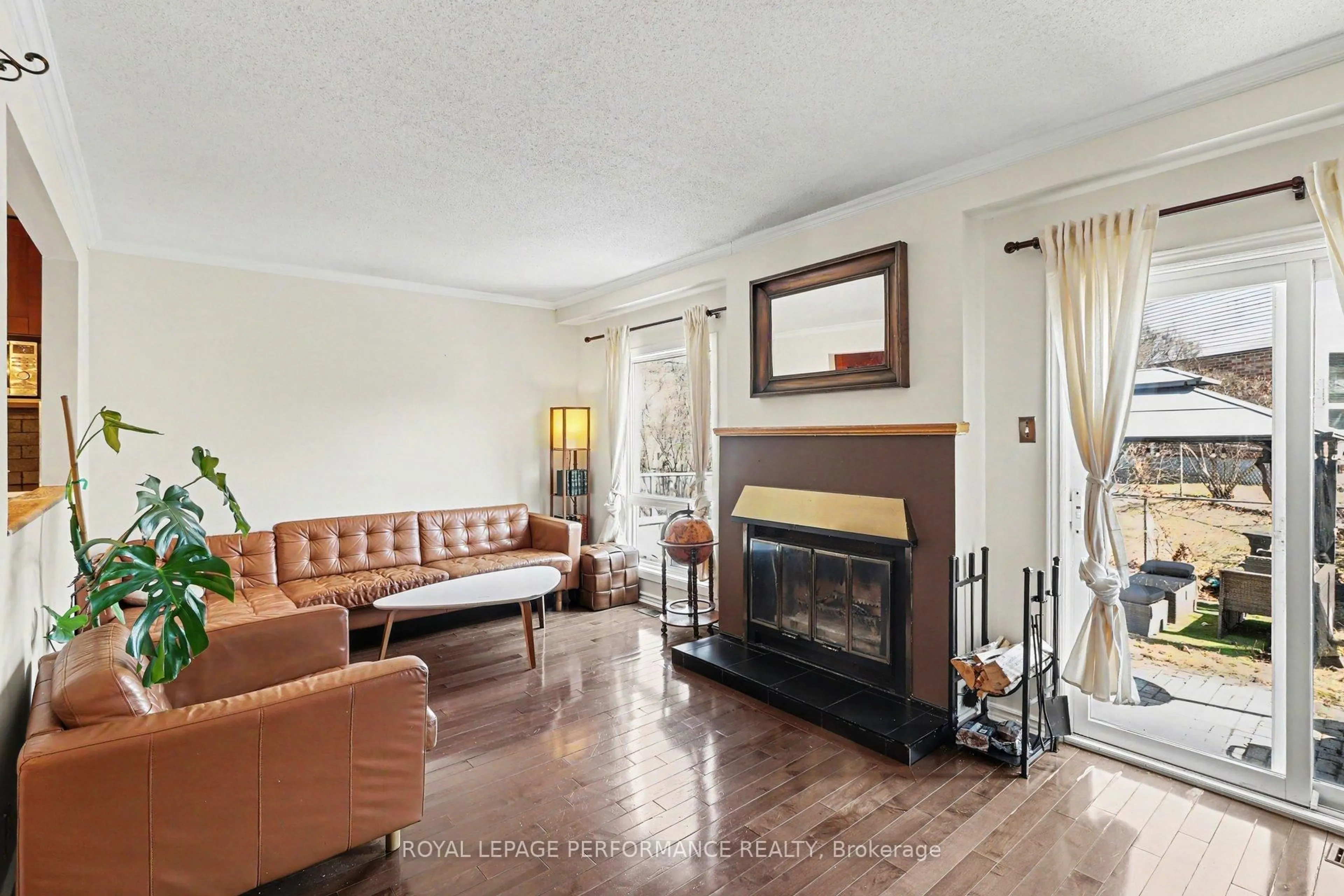 Living room with furniture, unknown for 7004 Bilberry Dr, Ottawa Ontario K1C 3R6