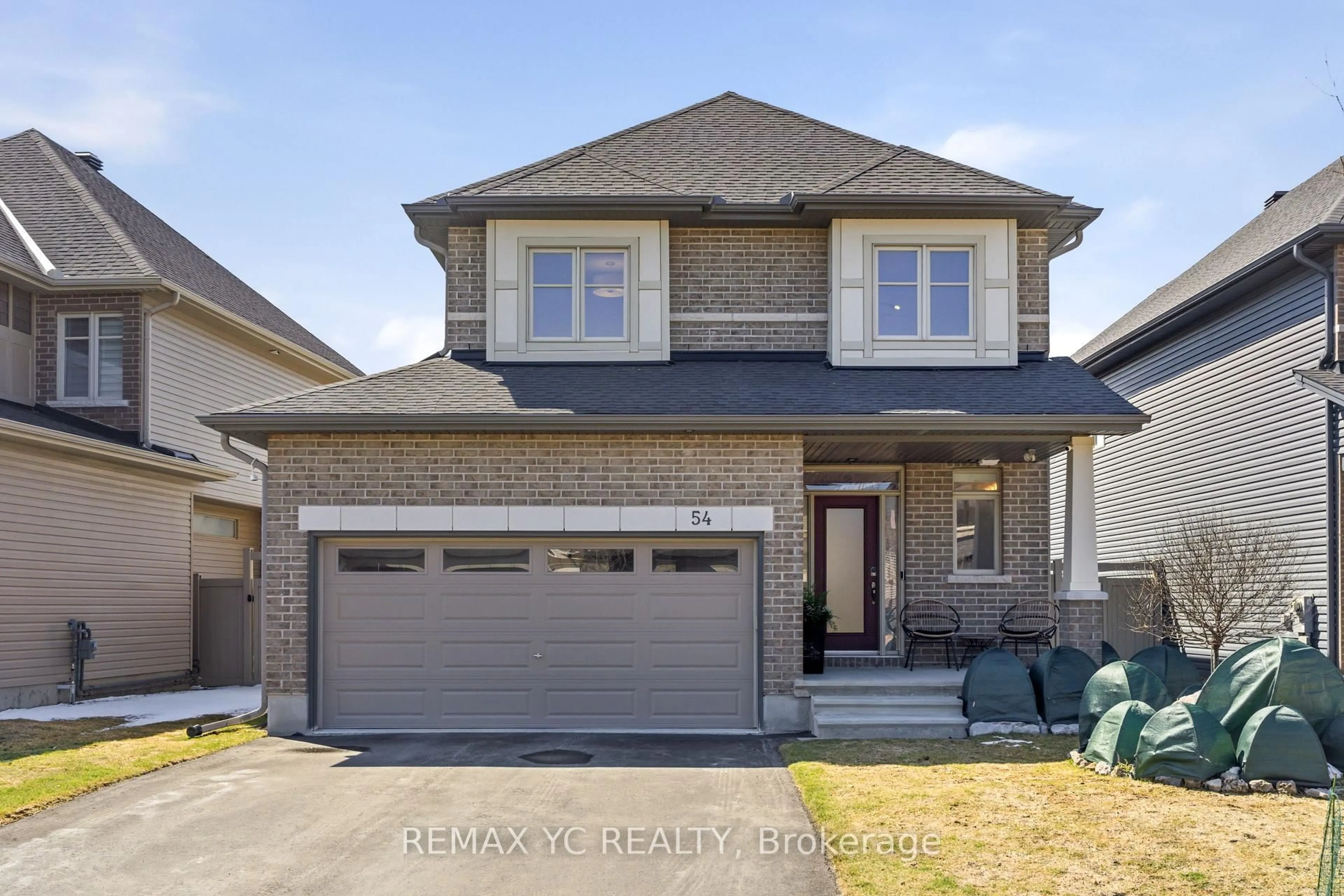Home with brick exterior material, street for 54 Angel Hts, Stittsville Ontario K2S 2N4
