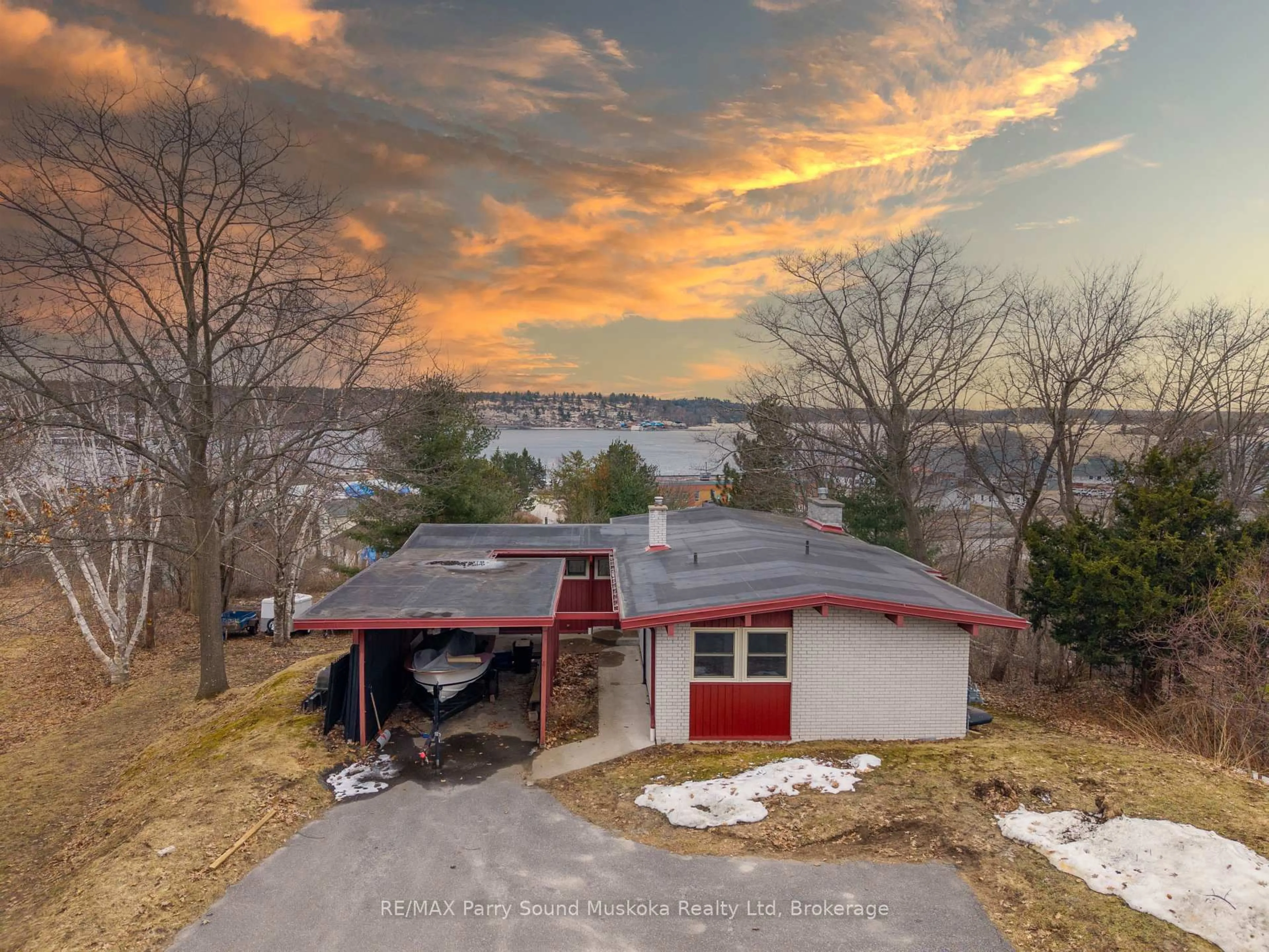A pic from outside/outdoor area/front of a property/back of a property/a pic from drone, water/lake/river/ocean view for 8 Sunset Ave, Parry Sound Ontario P2A 1A5