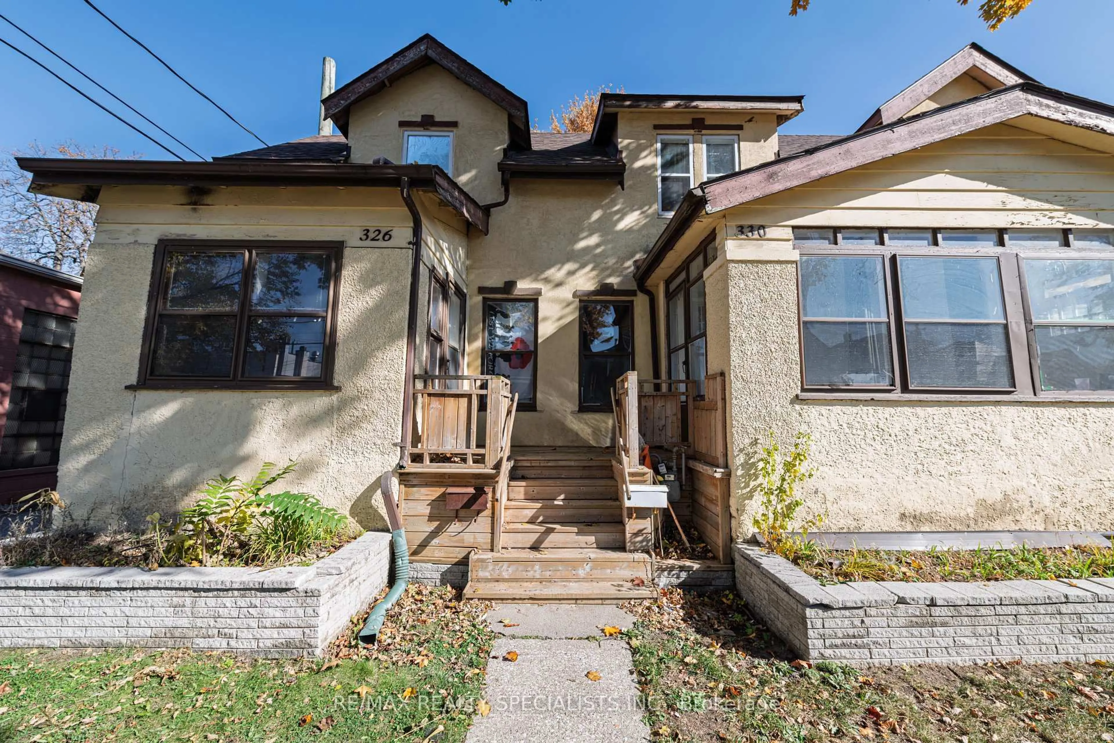 Home with brick exterior material, street for 332 Elm Ave, Windsor Ontario N9A 5H1