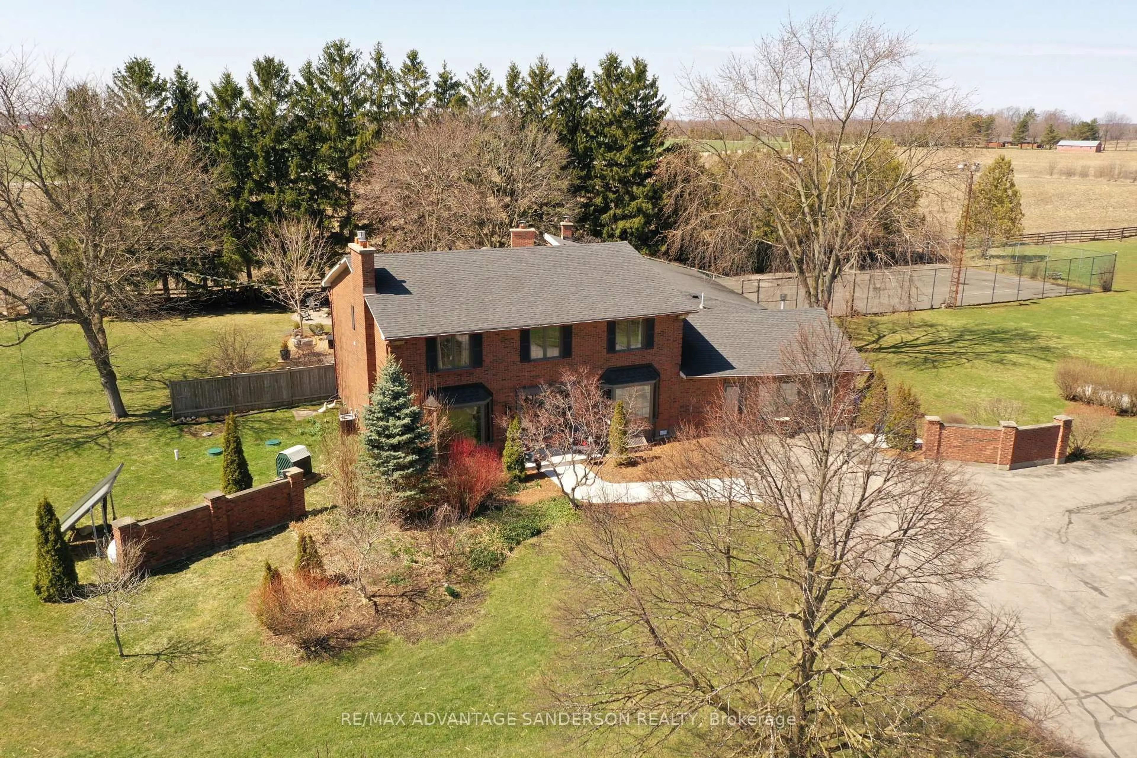 A pic from outside/outdoor area/front of a property/back of a property/a pic from drone, unknown for 21727 Vanneck Rd, Middlesex Centre Ontario N0L 1R0