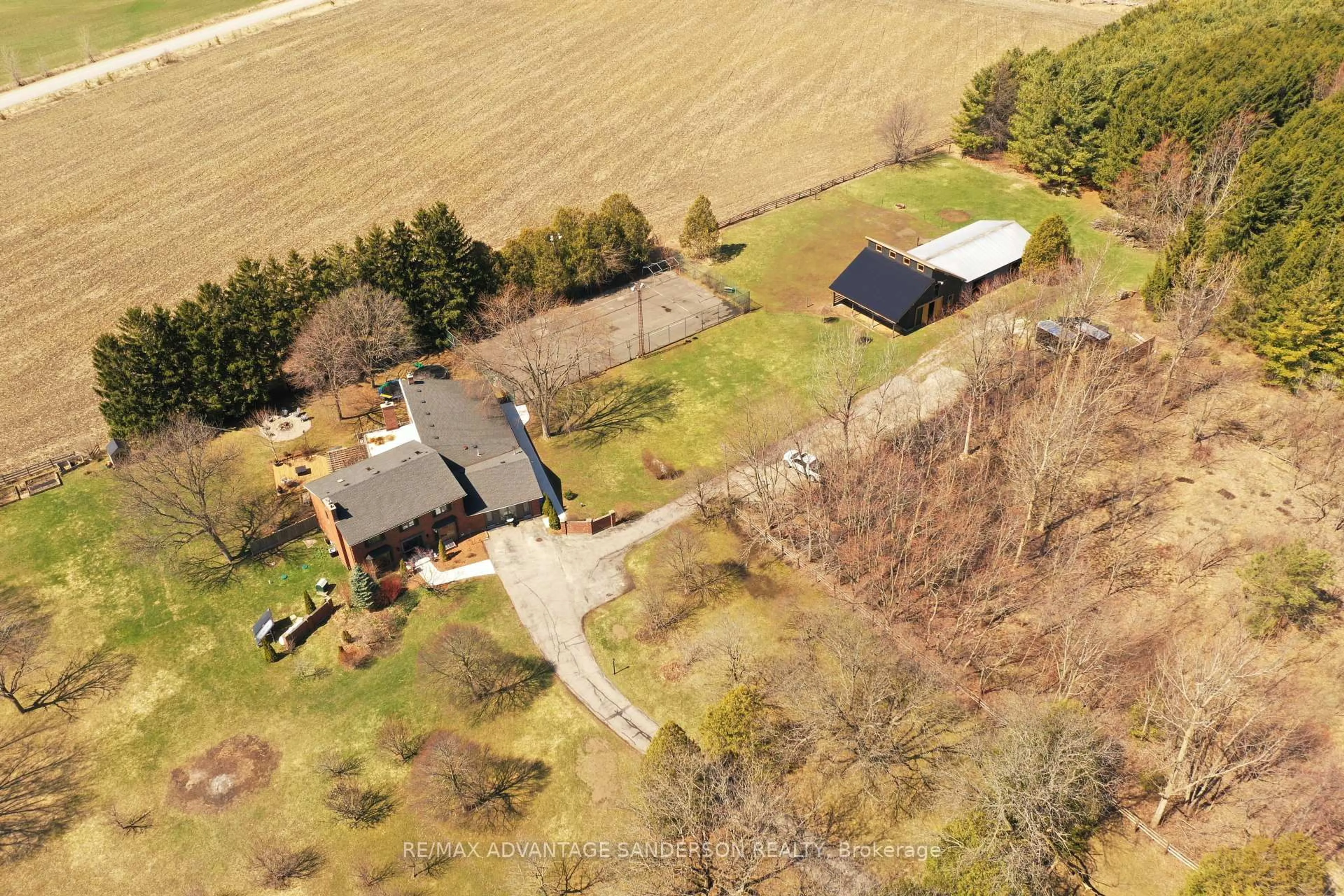 A pic from outside/outdoor area/front of a property/back of a property/a pic from drone, unknown for 21727 Vanneck Rd, Middlesex Centre Ontario N0L 1R0