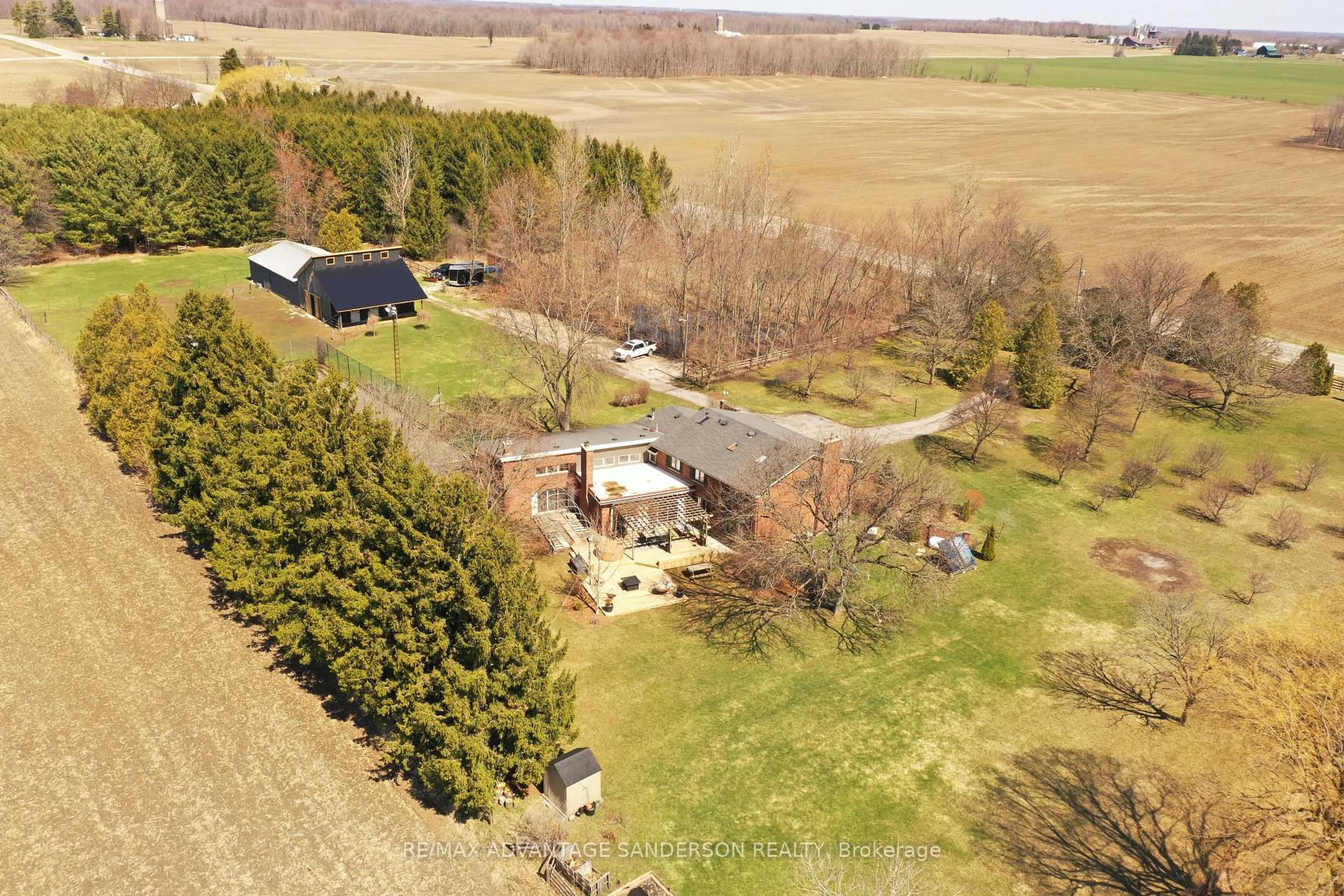 A pic from outside/outdoor area/front of a property/back of a property/a pic from drone, unknown for 21727 Vanneck Rd, Middlesex Centre Ontario N0L 1R0