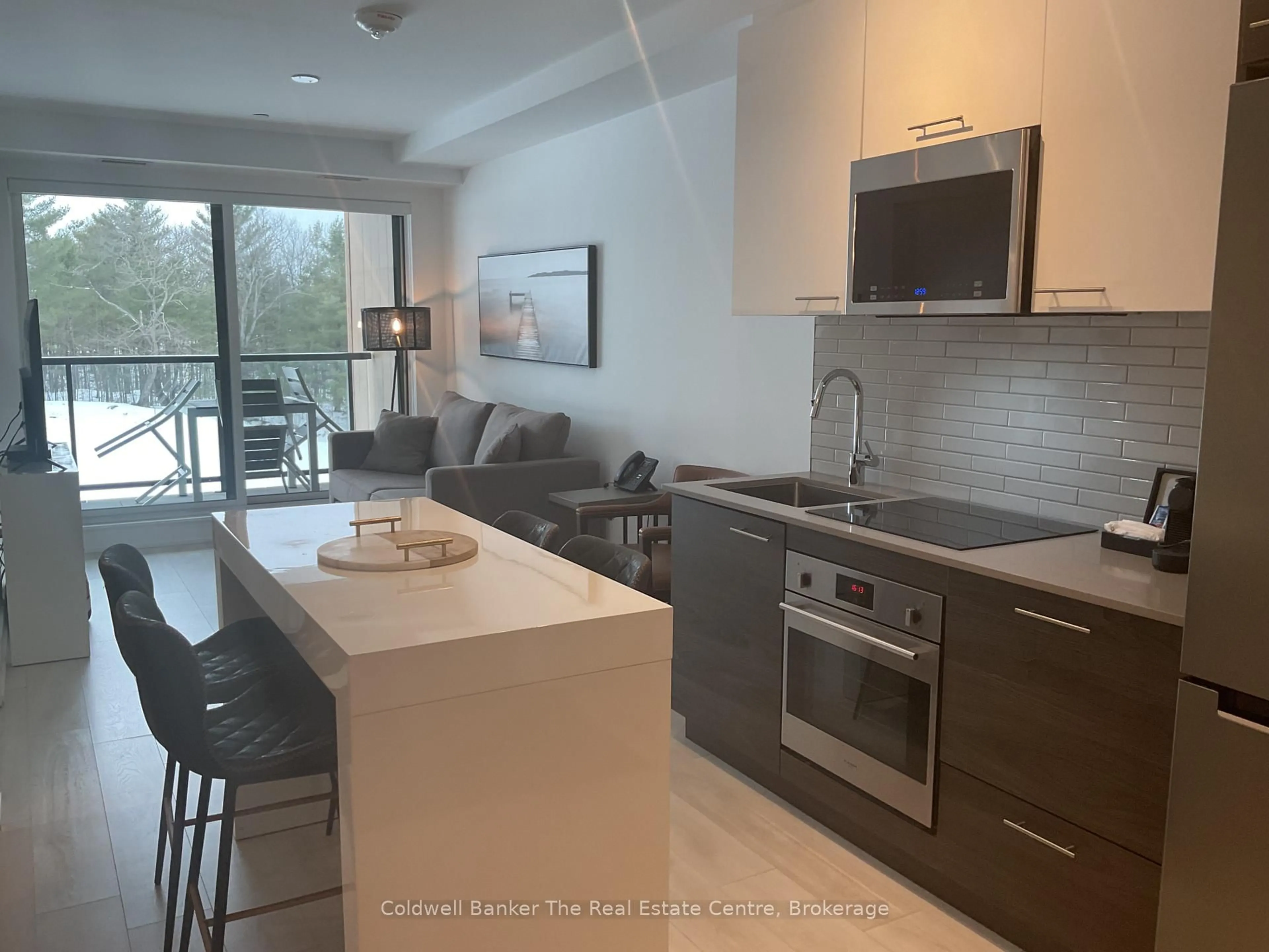 Open concept kitchen, unknown for 120 Carrick Tr #305, Gravenhurst Ontario P1P 0B6