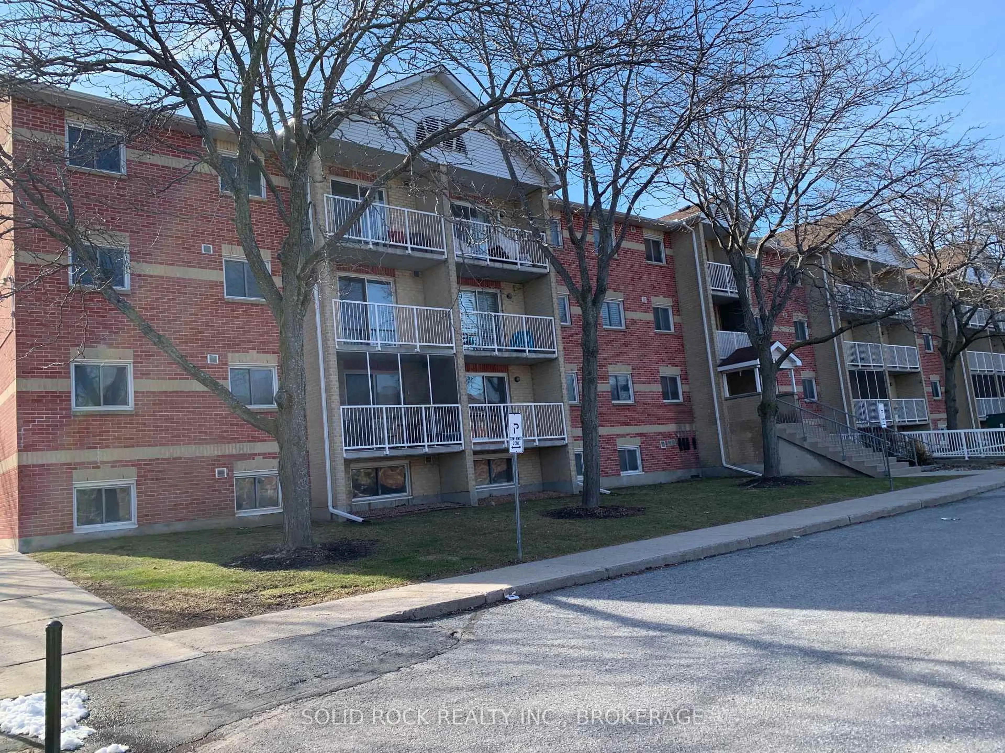 A pic from outside/outdoor area/front of a property/back of a property/a pic from drone, street for 310 Kingsdale Ave #213, Kingston Ontario K7M 8S1