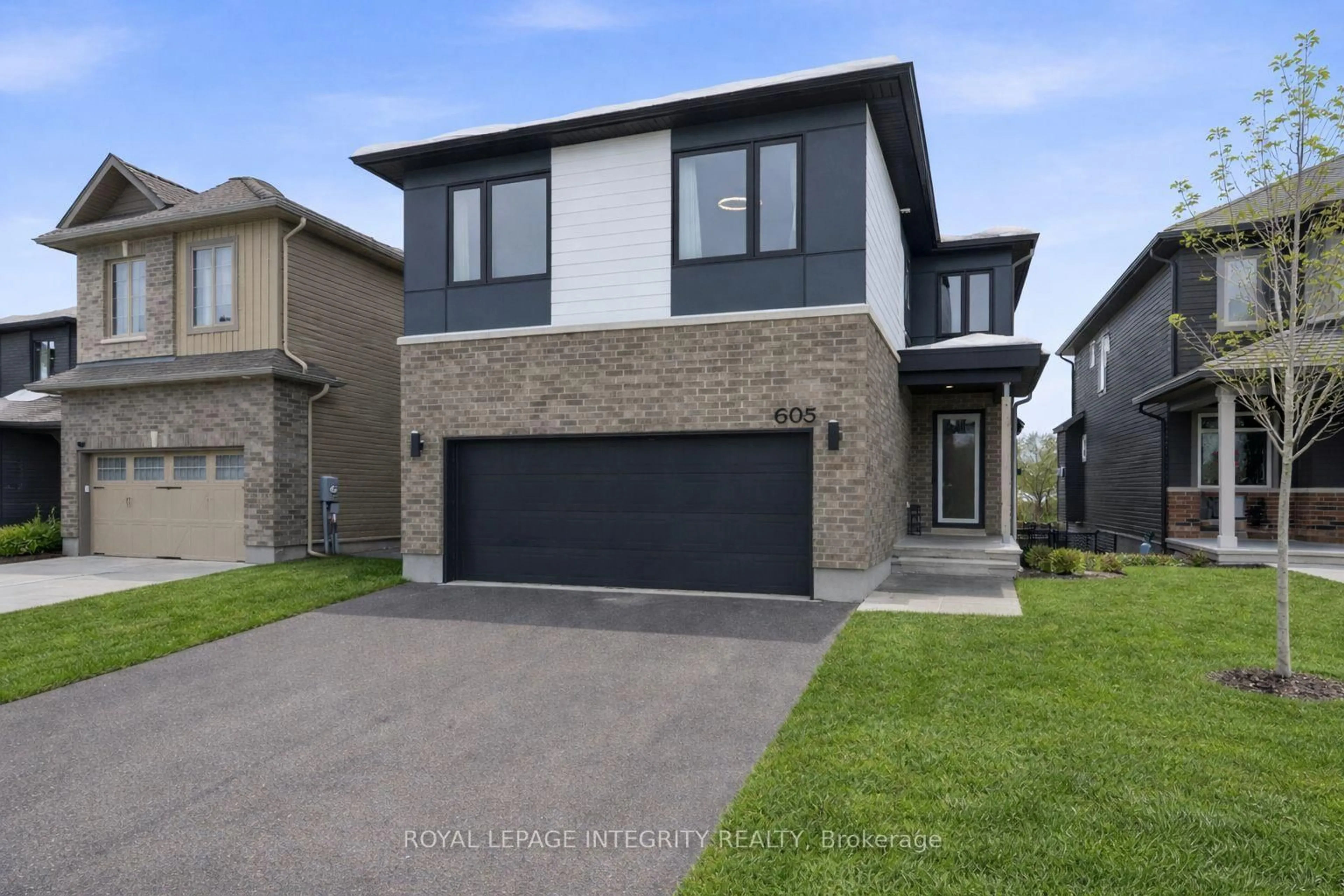 Home with brick exterior material, street for 605 Enclave Lane, Clarence-Rockland Ontario K4K 0M8