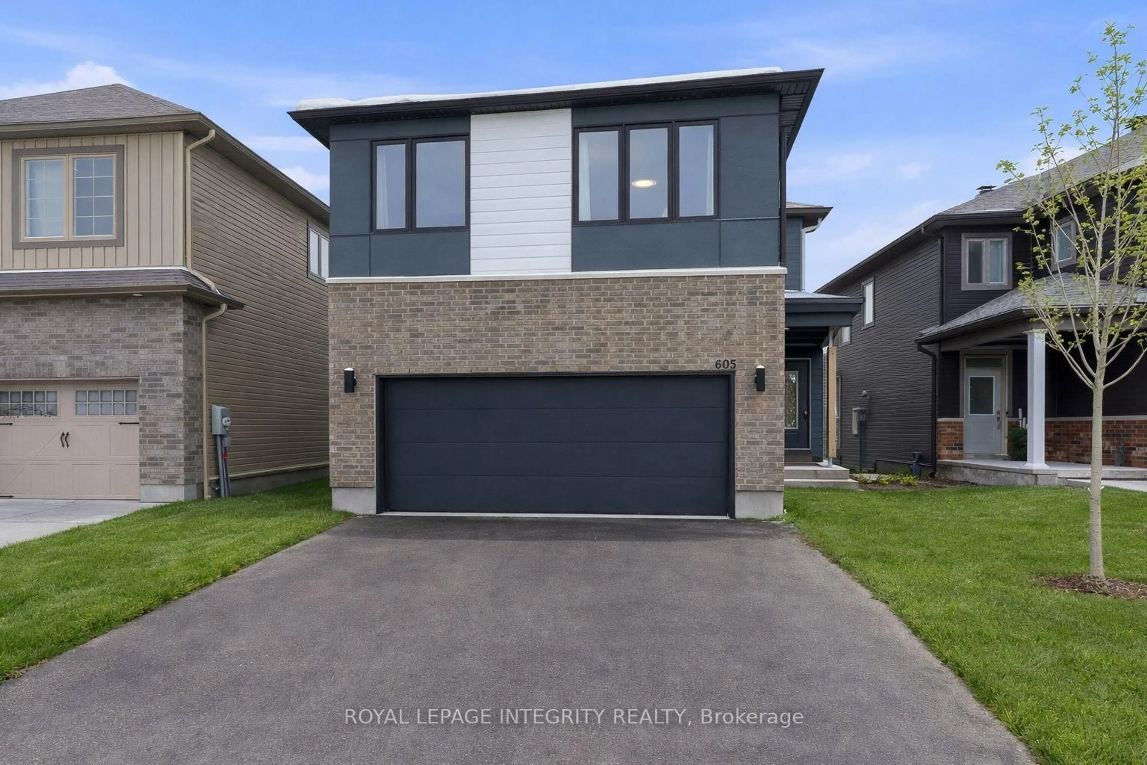 Home with brick exterior material, street for 605 Enclave Lane, Clarence-Rockland Ontario K4K 0M8