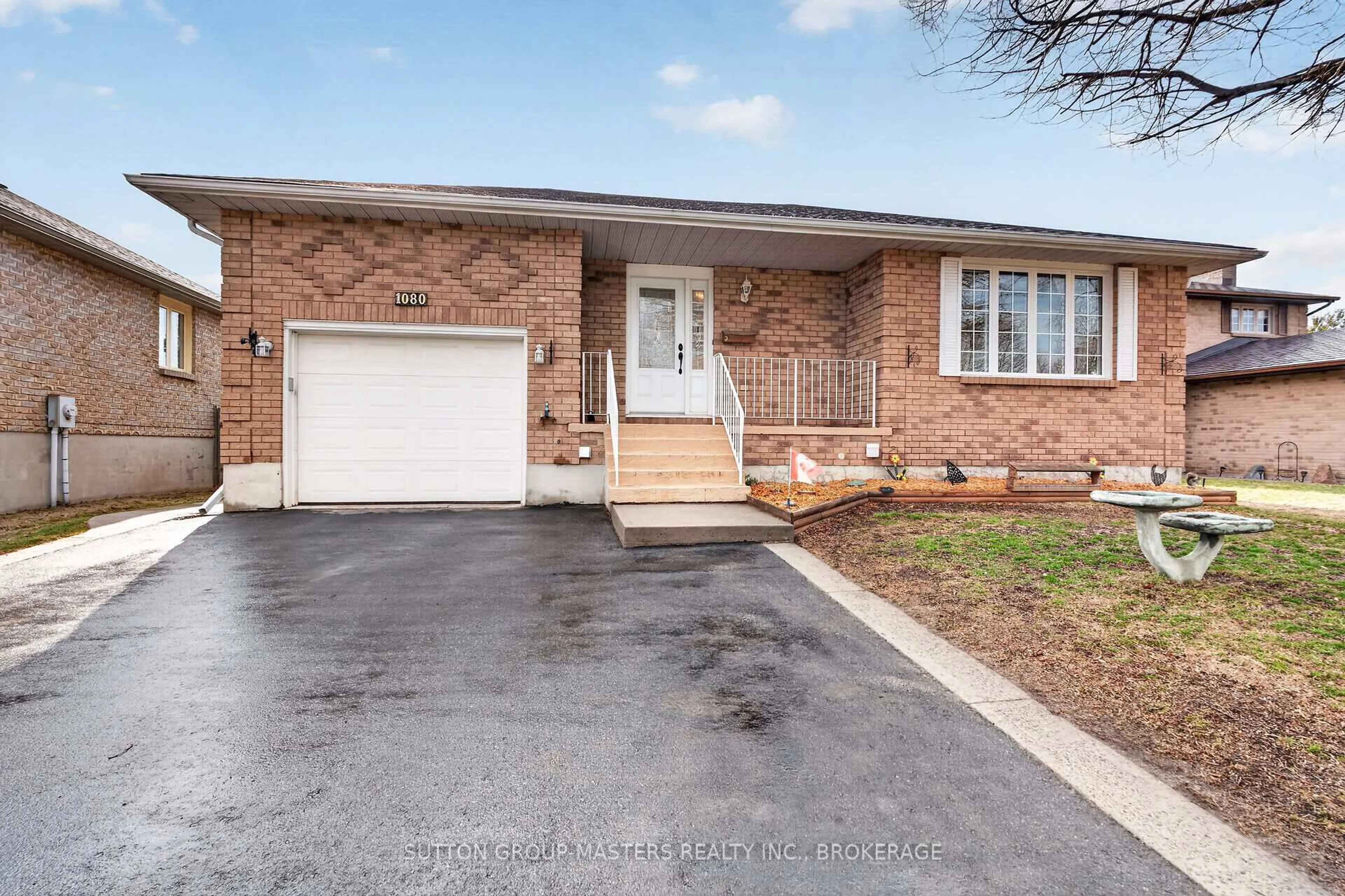 Home with brick exterior material, street for 1080 Palmerston Cres, Kingston Ontario K7P 2P5