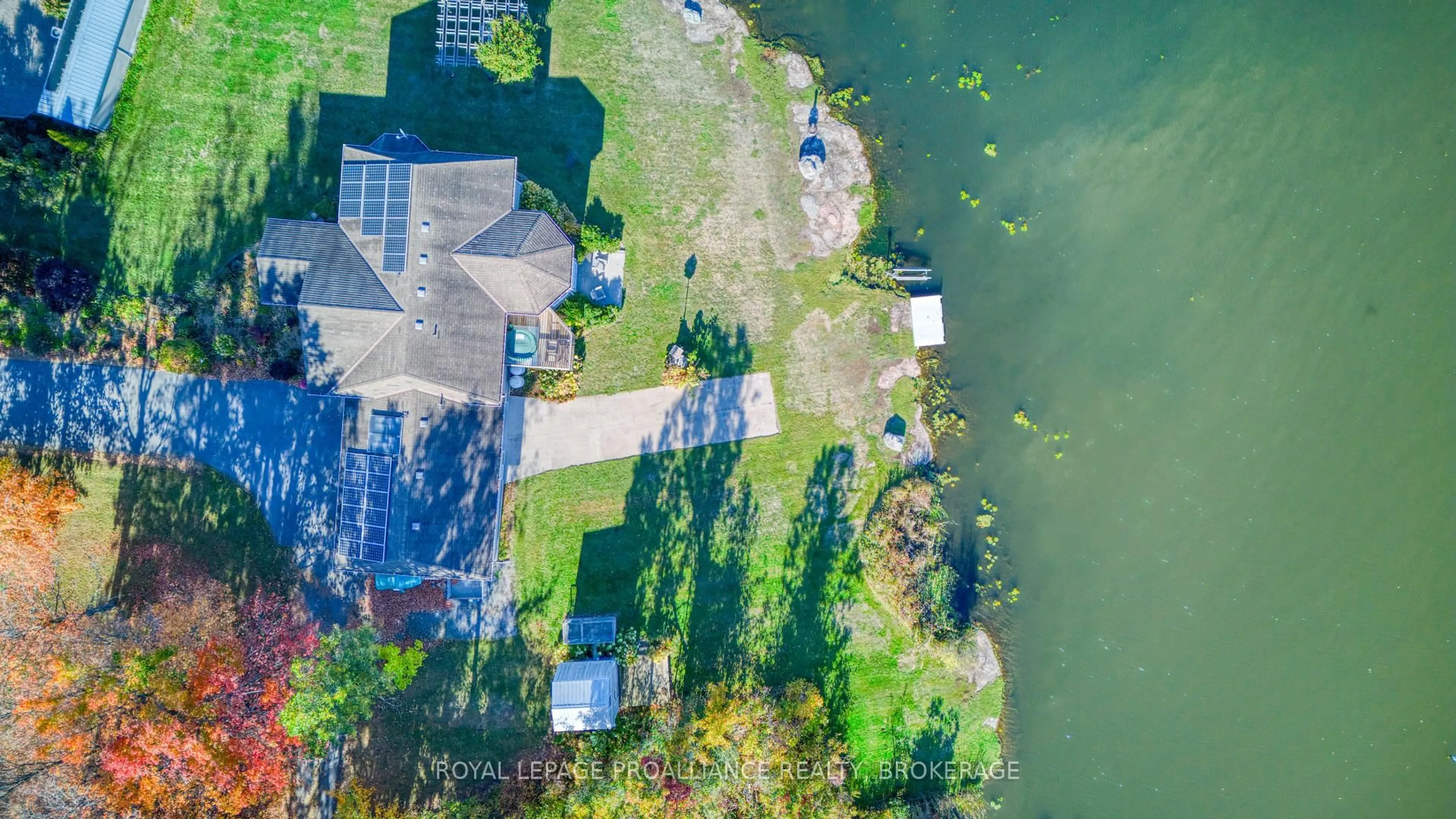 A pic from outside/outdoor area/front of a property/back of a property/a pic from drone, water/lake/river/ocean view for 2318 Highway 15, Kingston Ontario K7L 4V3