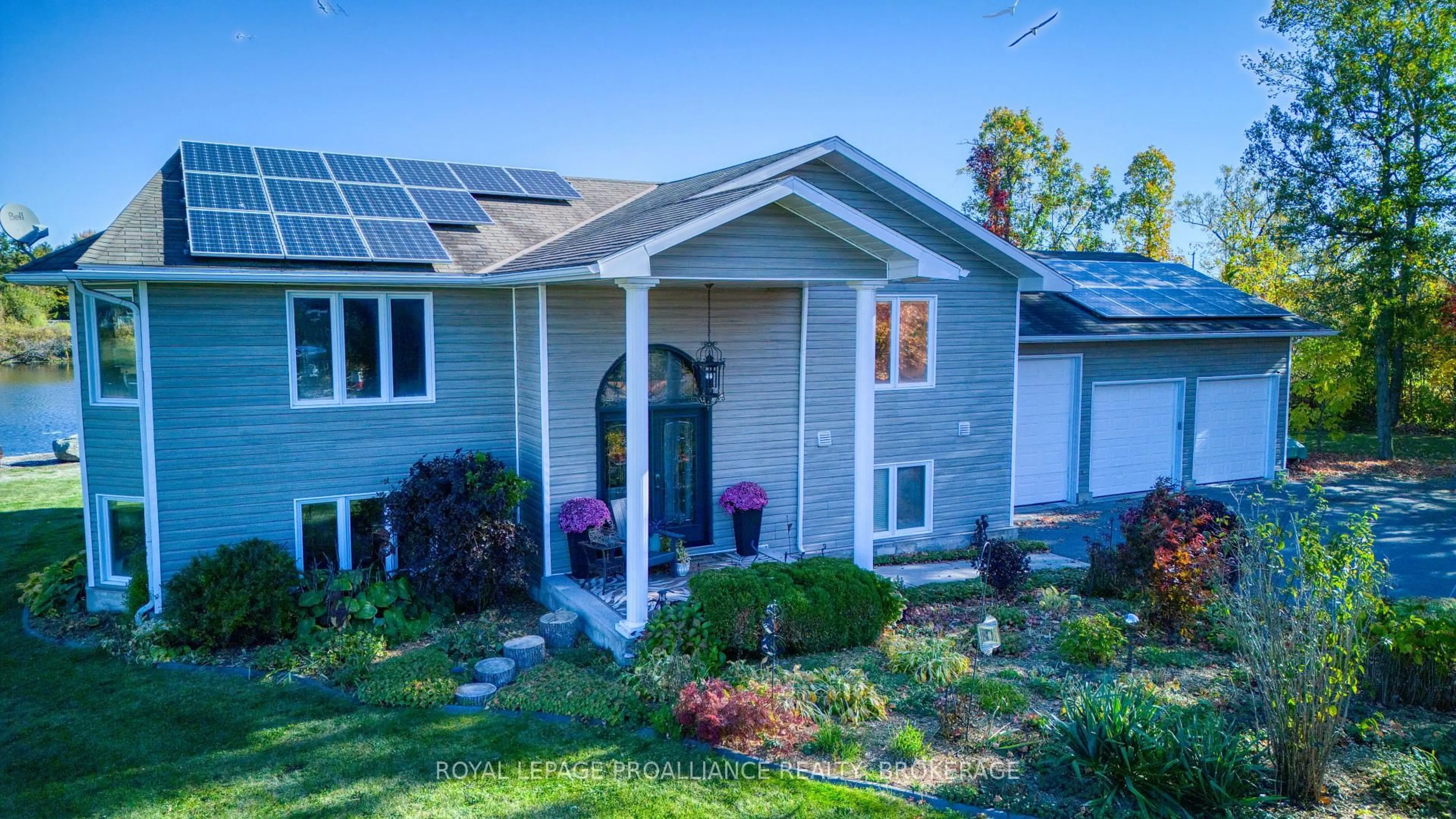 Home with vinyl exterior material, street for 2318 Highway 15, Kingston Ontario K7L 4V3