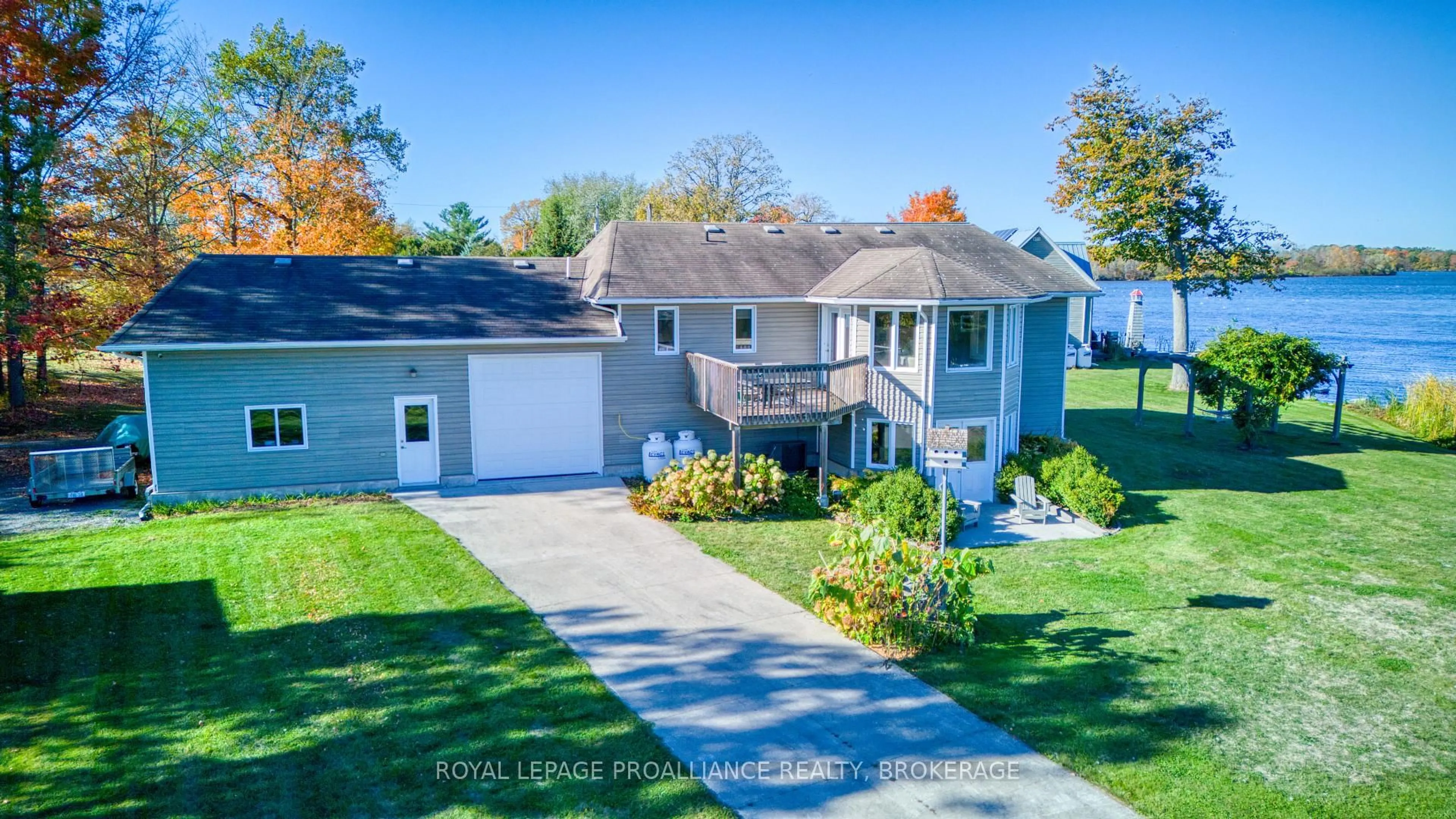 A pic from outside/outdoor area/front of a property/back of a property/a pic from drone, street for 2318 Highway 15, Kingston Ontario K7L 4V3