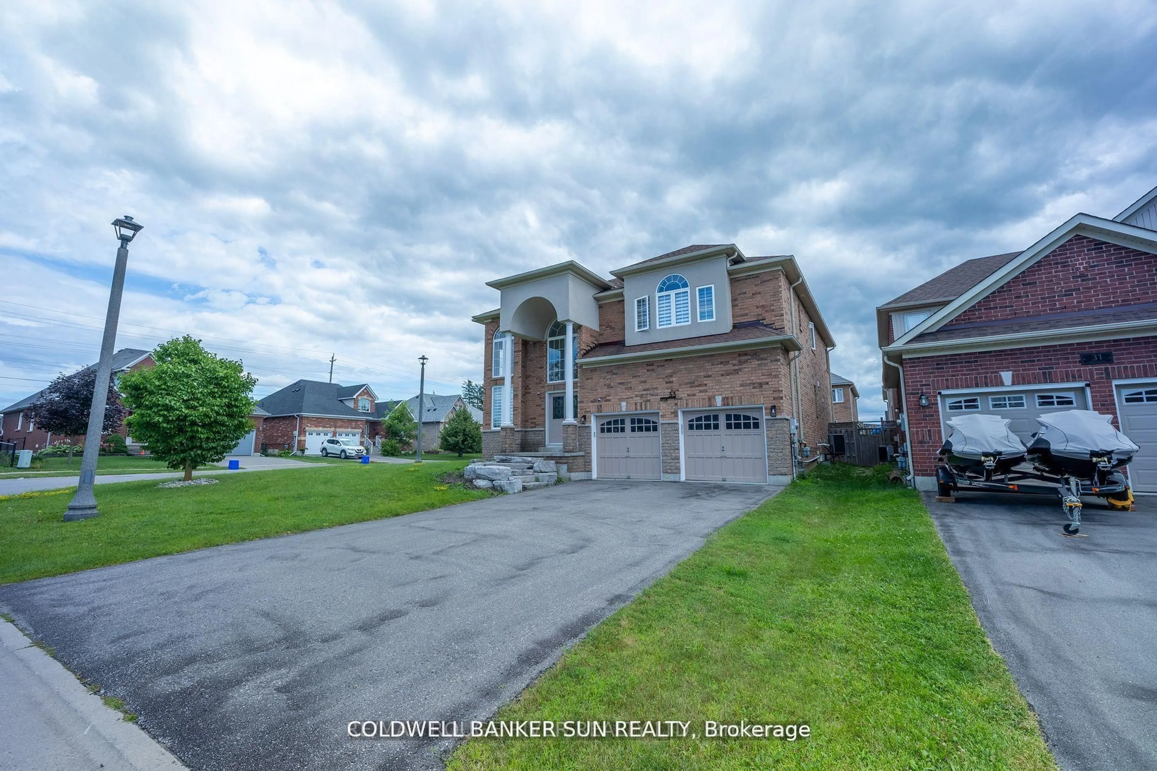 A pic from outside/outdoor area/front of a property/back of a property/a pic from drone, street for 33 Ellis Cres, Kawartha Lakes Ontario K9V 0A5