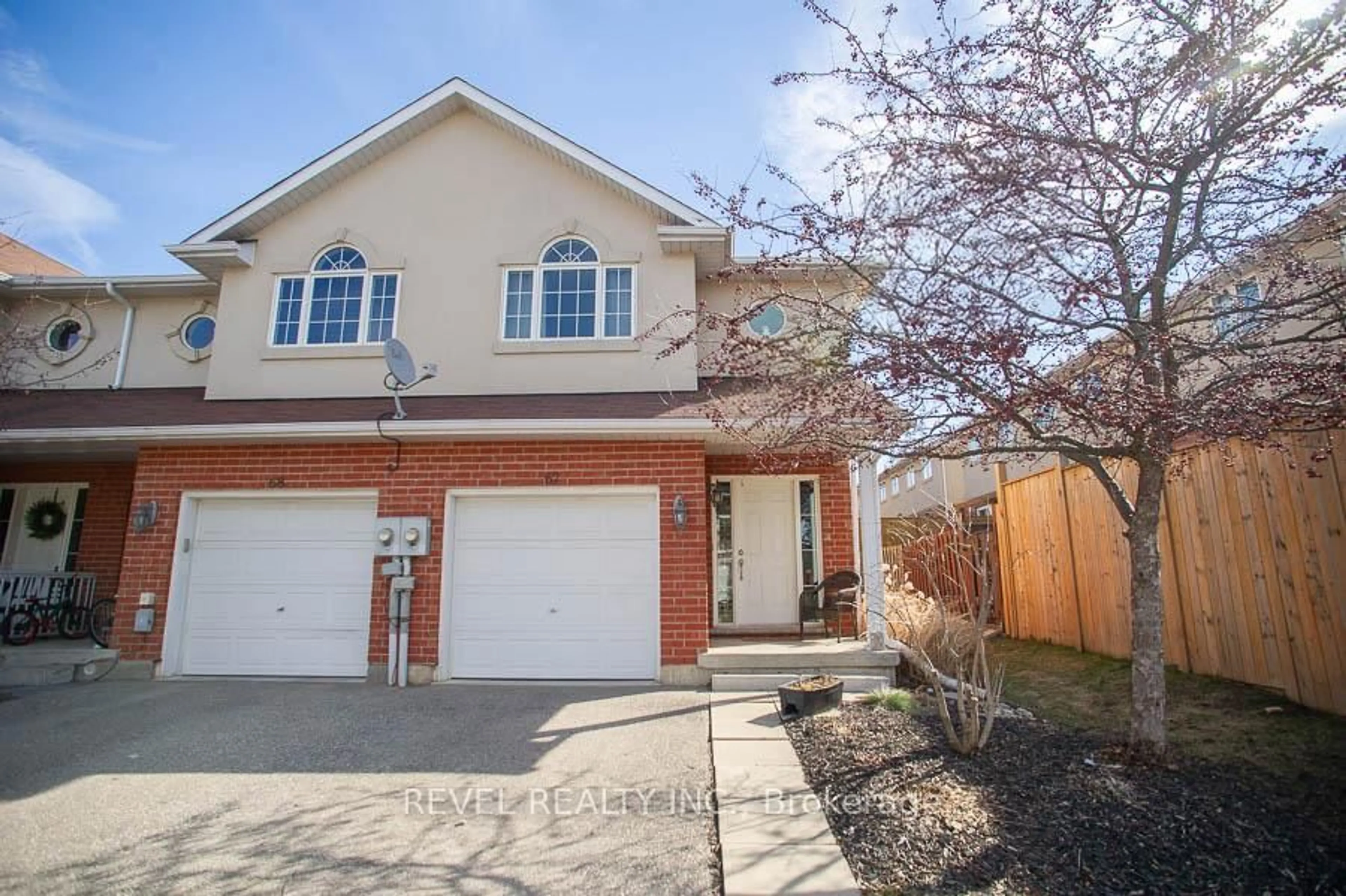 Home with brick exterior material, street for 20 McConkey Cres #67, Brantford Ontario N3S 0C1