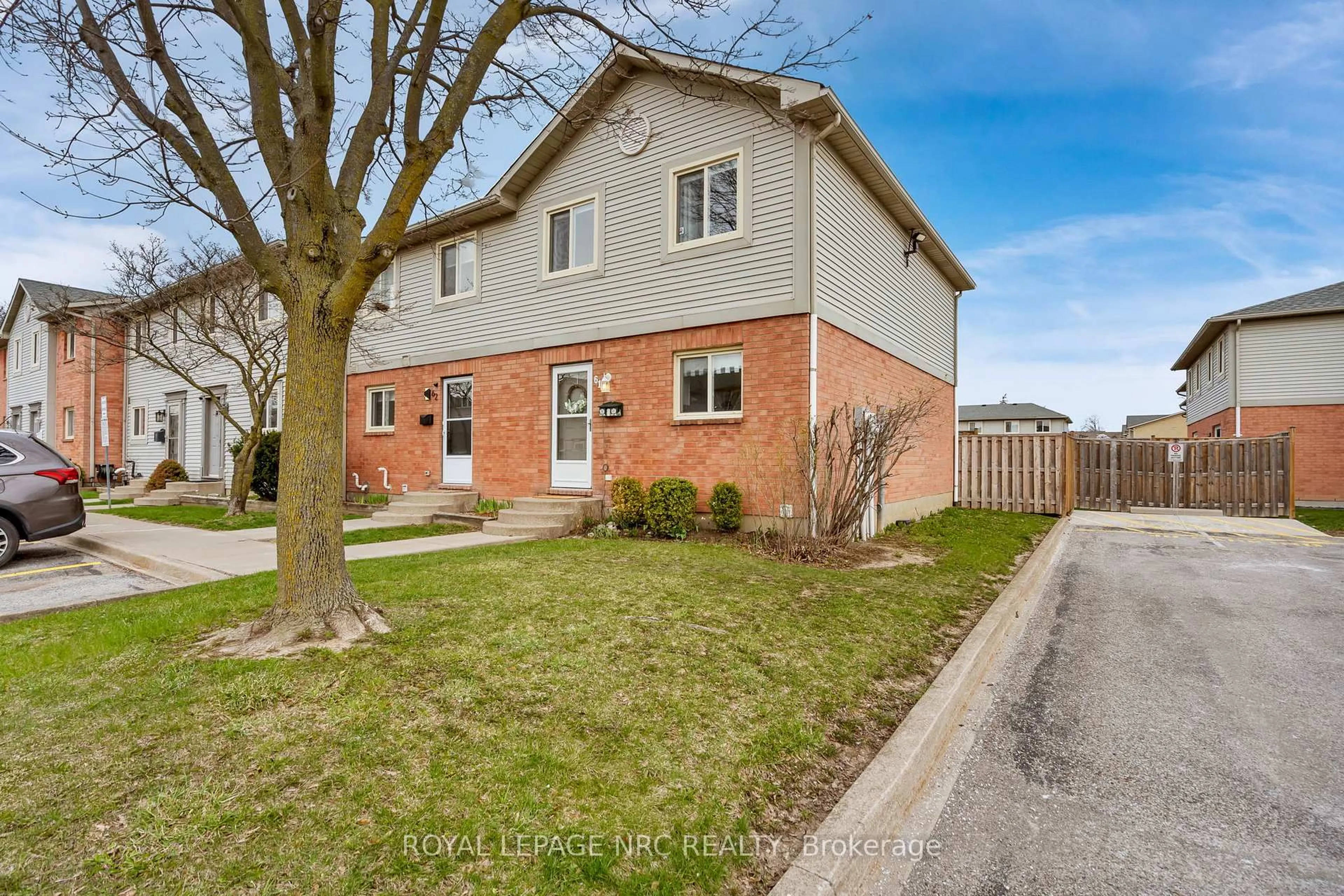 Home with brick exterior material, street for 65 Dorchester Blvd #61, St. Catharines Ontario L2M 7T1