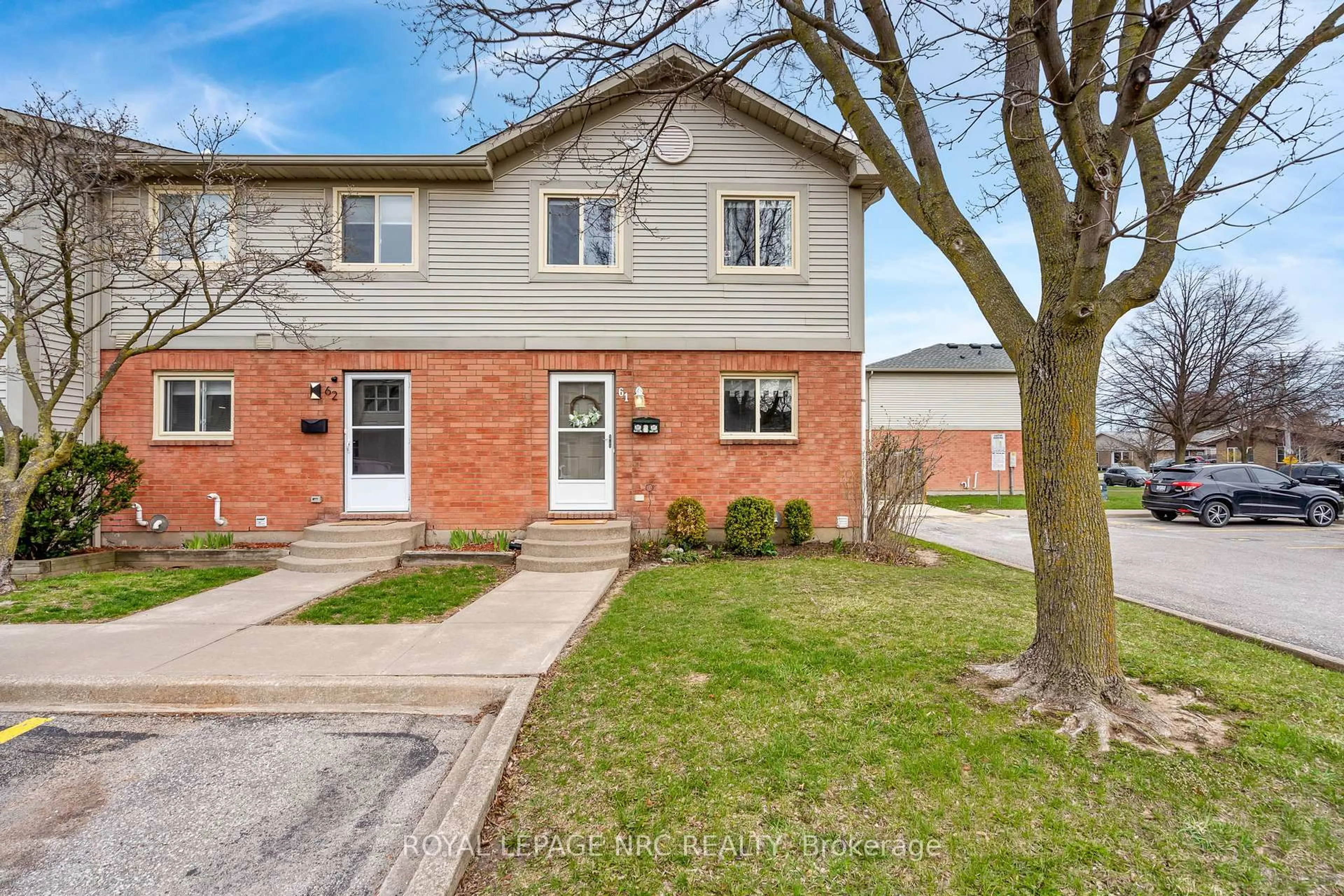 Home with brick exterior material, street for 65 Dorchester Blvd #61, St. Catharines Ontario L2M 7T1