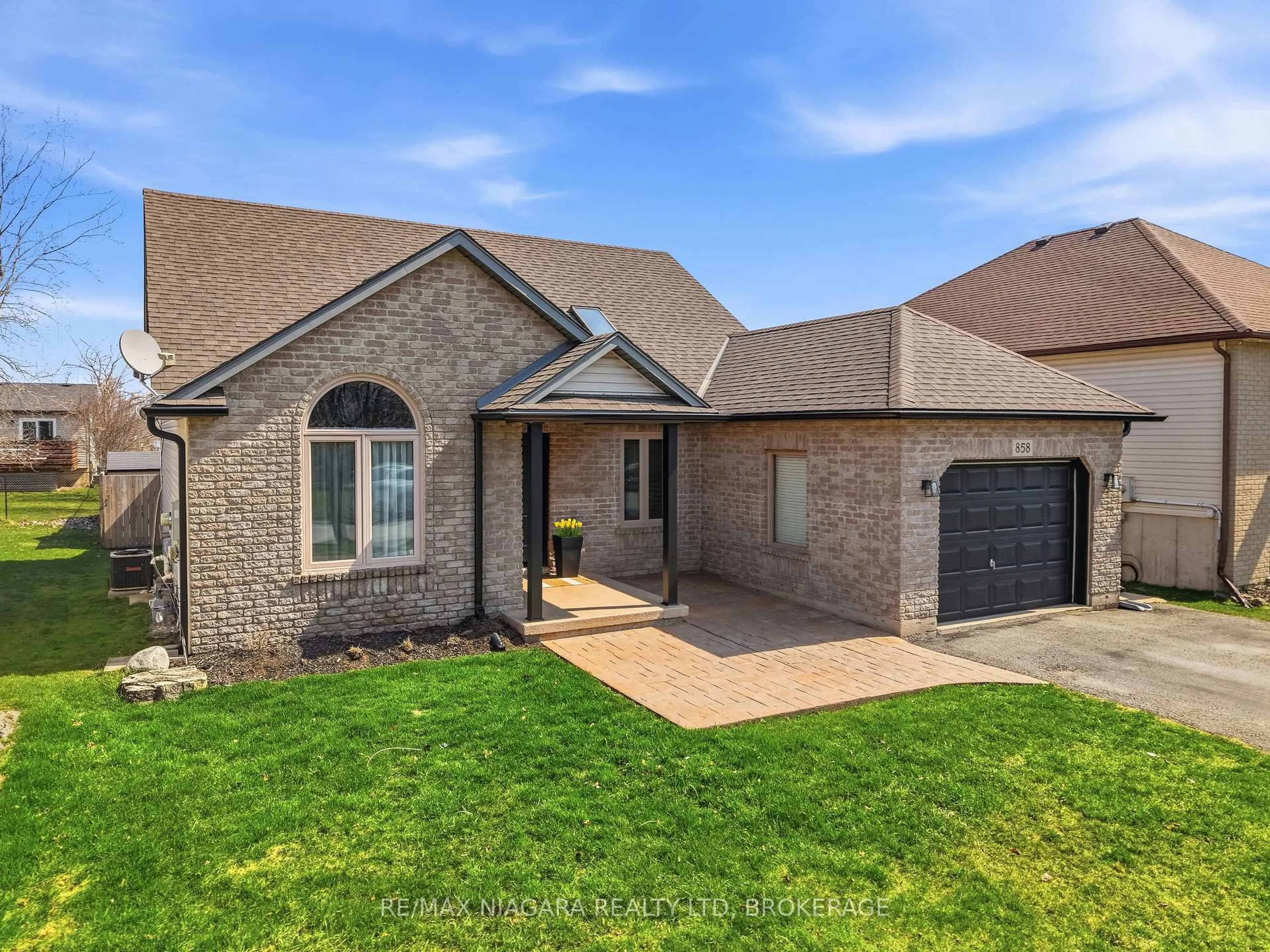 Home with brick exterior material, street for 858 Canada Dr, Fort Erie Ontario L2A 6E9