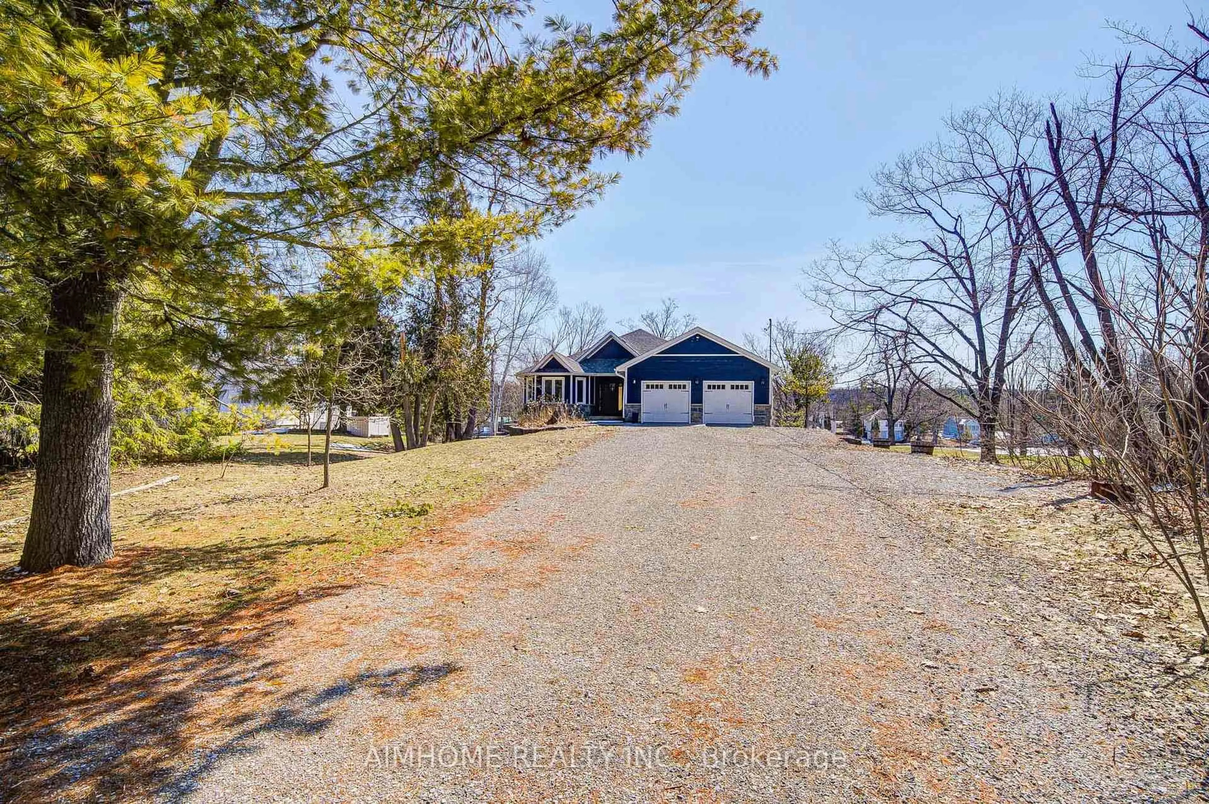 A pic from outside/outdoor area/front of a property/back of a property/a pic from drone, water/lake/river/ocean view for 62 Fire Route 94, Trent Lakes Ontario K0M 1A0