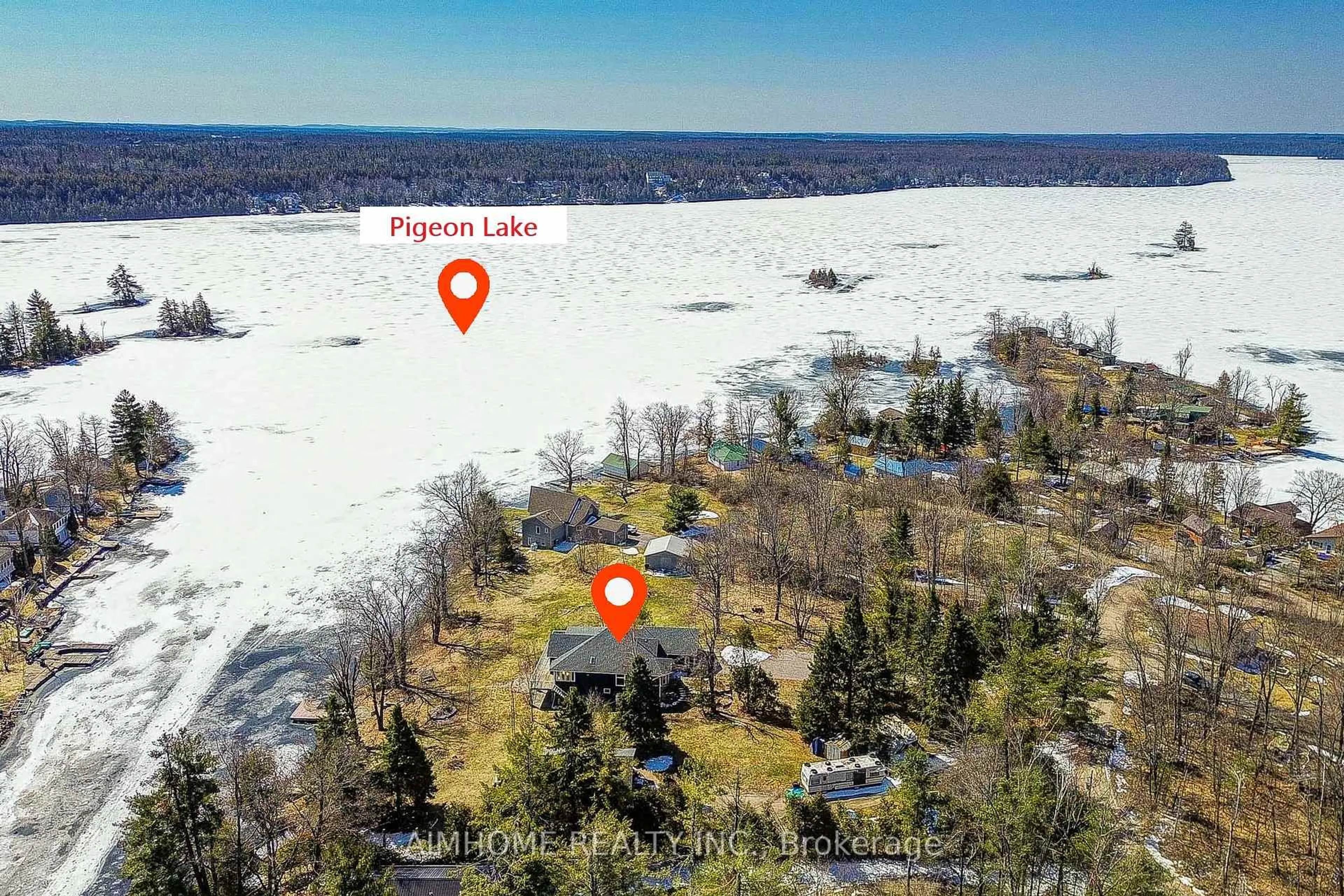 A pic from outside/outdoor area/front of a property/back of a property/a pic from drone, water/lake/river/ocean view for 62 Fire Route 94, Trent Lakes Ontario K0M 1A0
