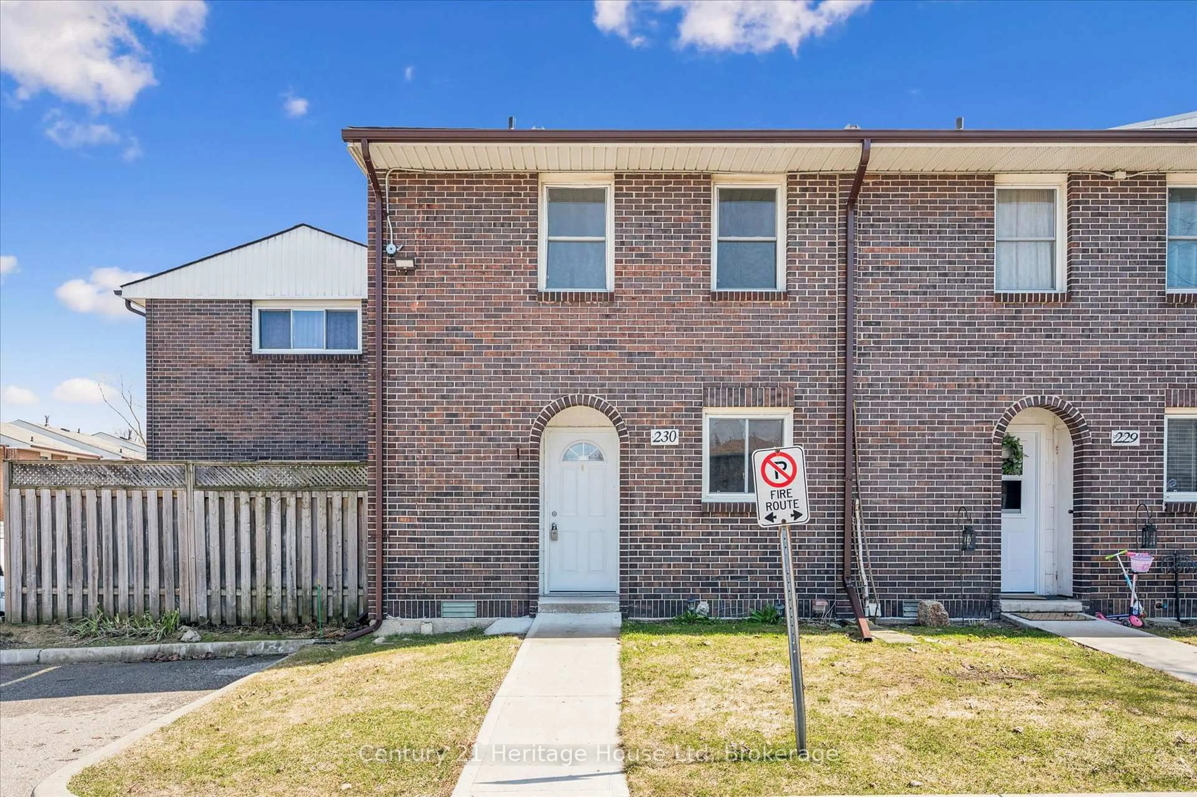 Home with brick exterior material, street for 31 Greengate Rd #230, Guelph Ontario N1H 6R3