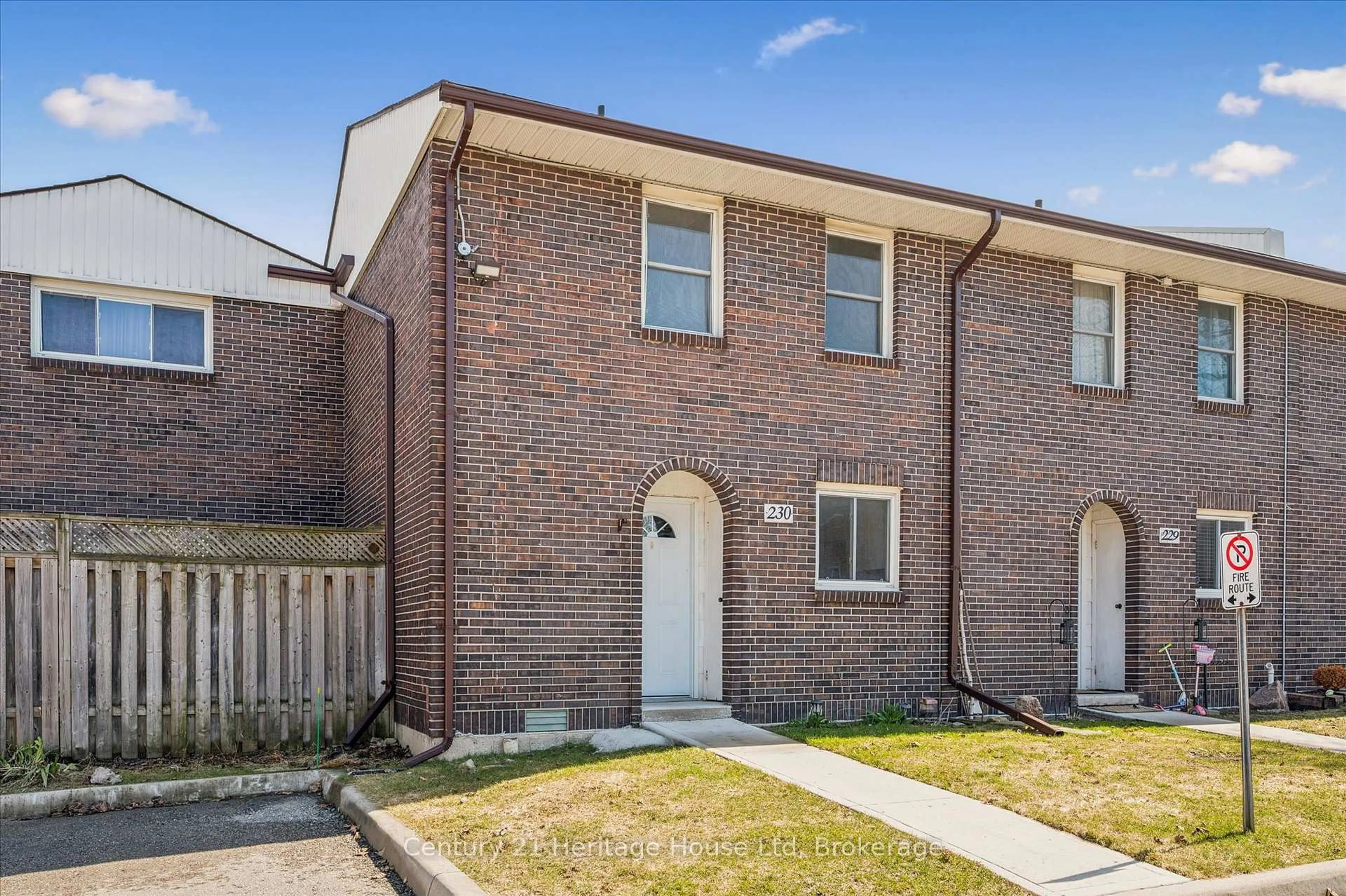 Home with brick exterior material, street for 31 Greengate Rd #230, Guelph Ontario N1H 6R3