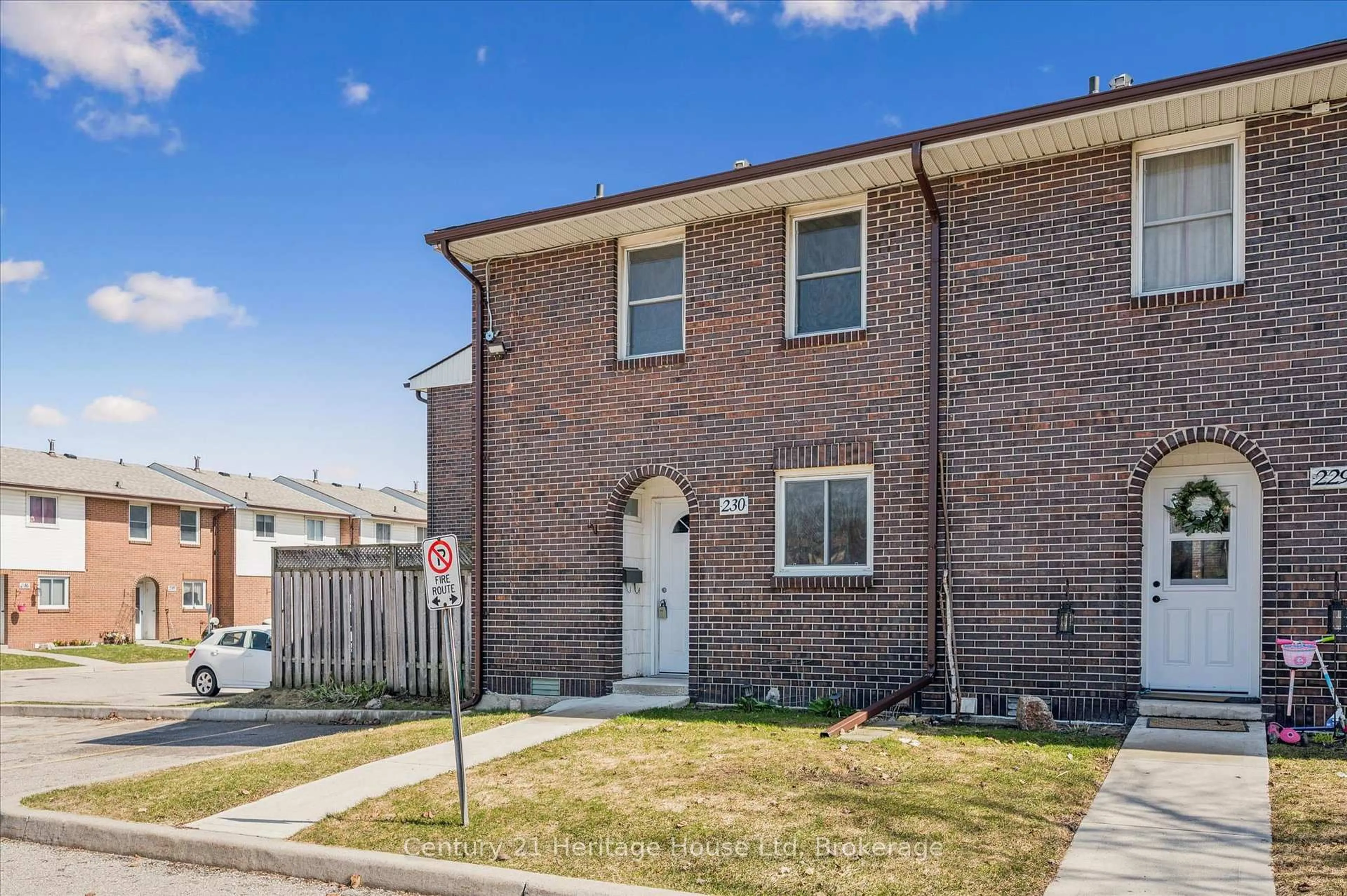 Home with brick exterior material, street for 31 Greengate Rd #230, Guelph Ontario N1H 6R3