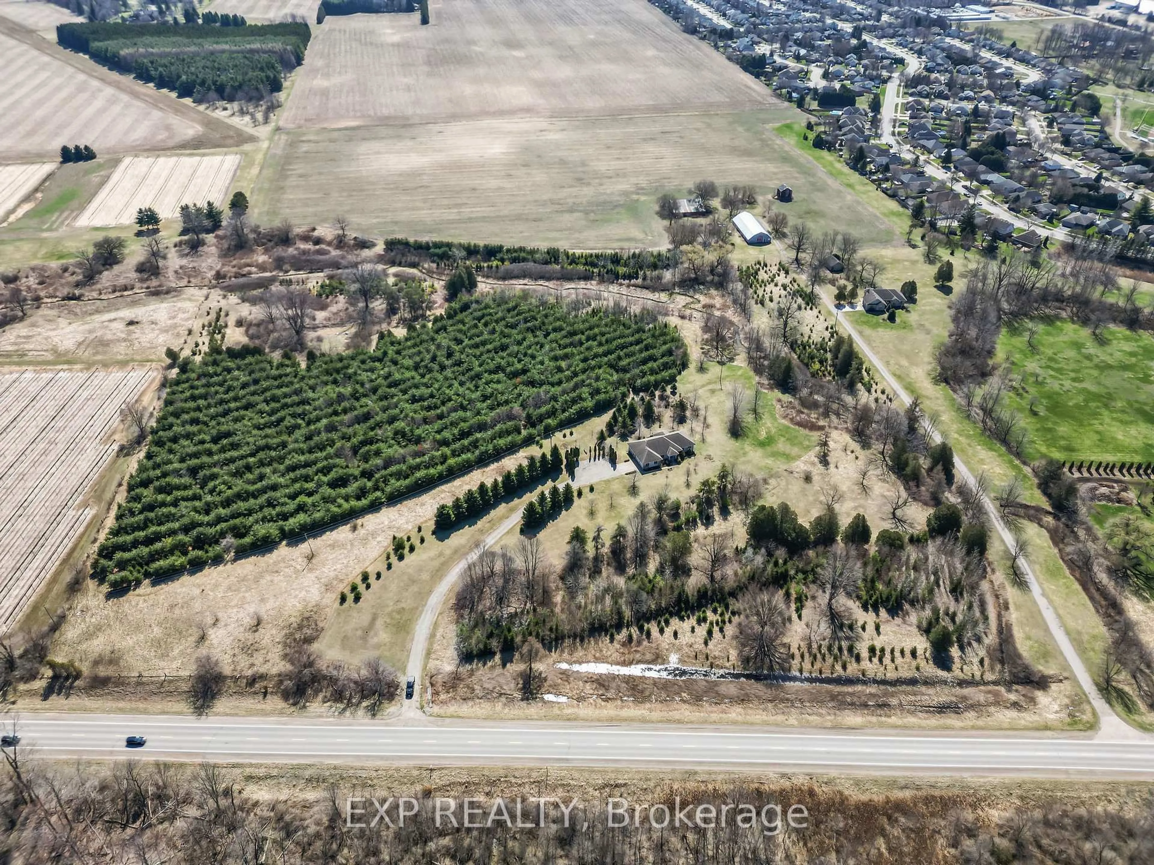 A pic from outside/outdoor area/front of a property/back of a property/a pic from drone, forest/trees view for 8371 Hickory Dr, Strathroy-Caradoc Ontario N7G 3H8