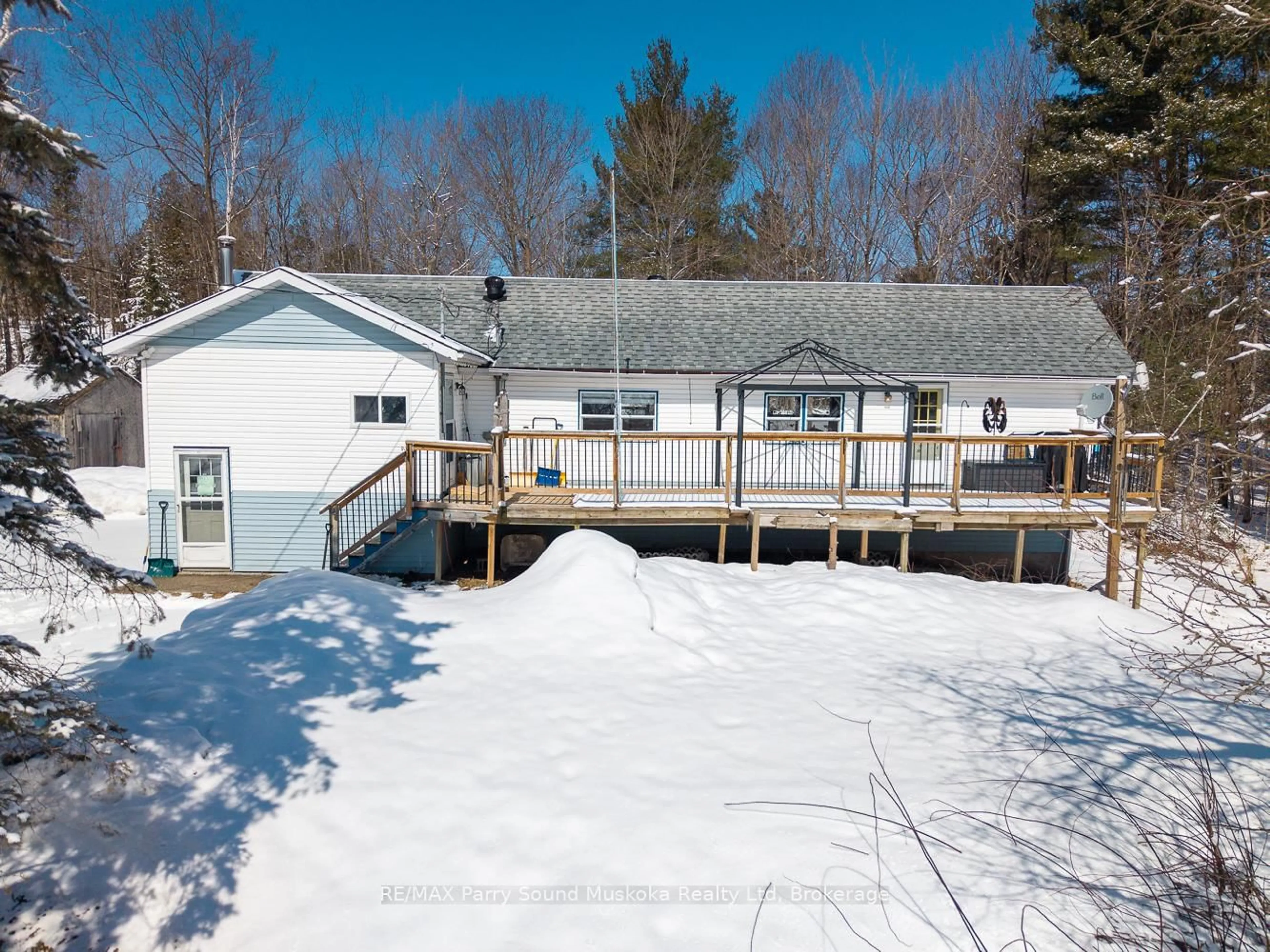 A pic from outside/outdoor area/front of a property/back of a property/a pic from drone, water/lake/river/ocean view for 1 Ted Donnelly Rd, McKellar Ontario P2A 0B5