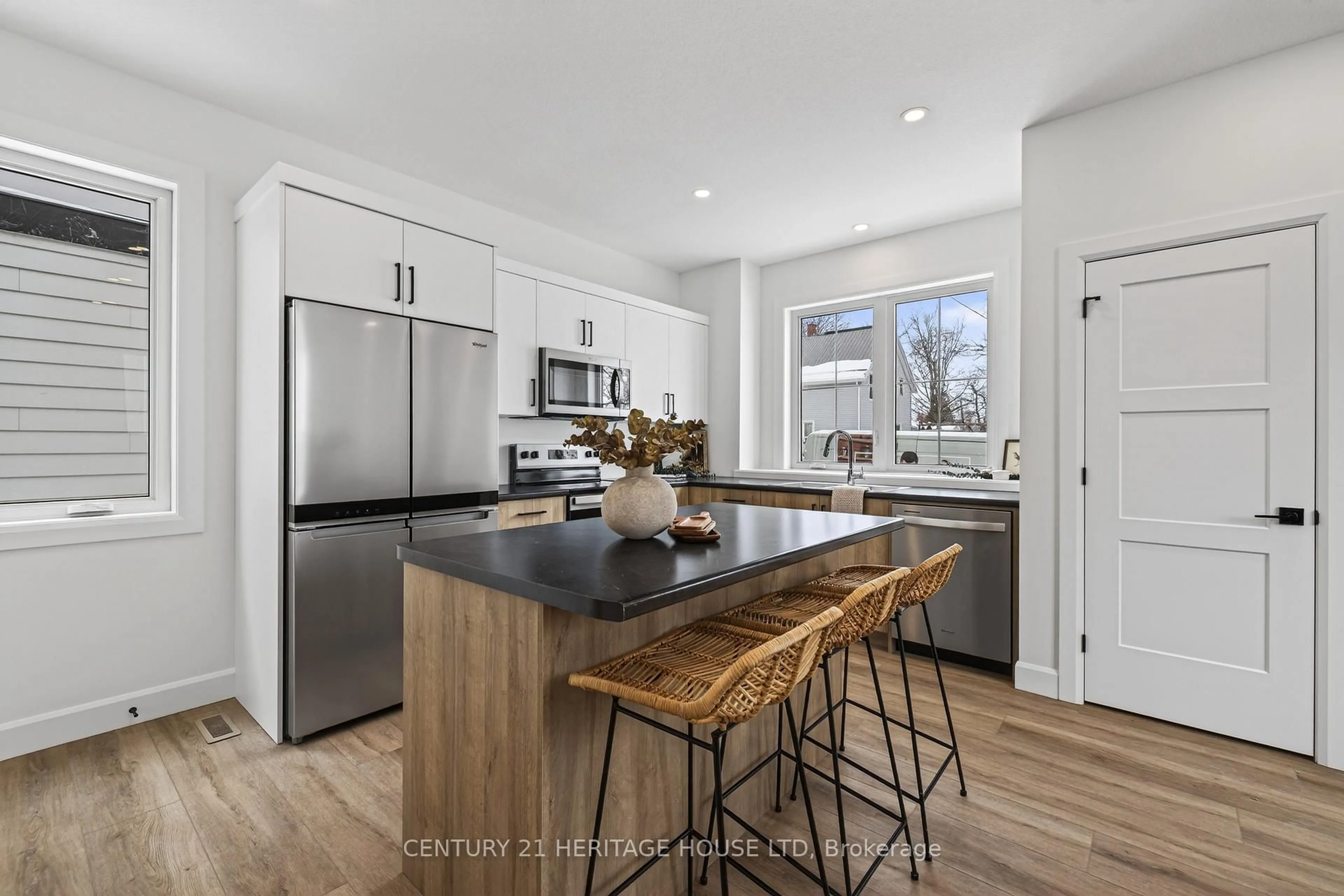 Open concept kitchen, wood/laminate floor for 51179 Ron Mcneil Line, Malahide Ontario N0L 2J0