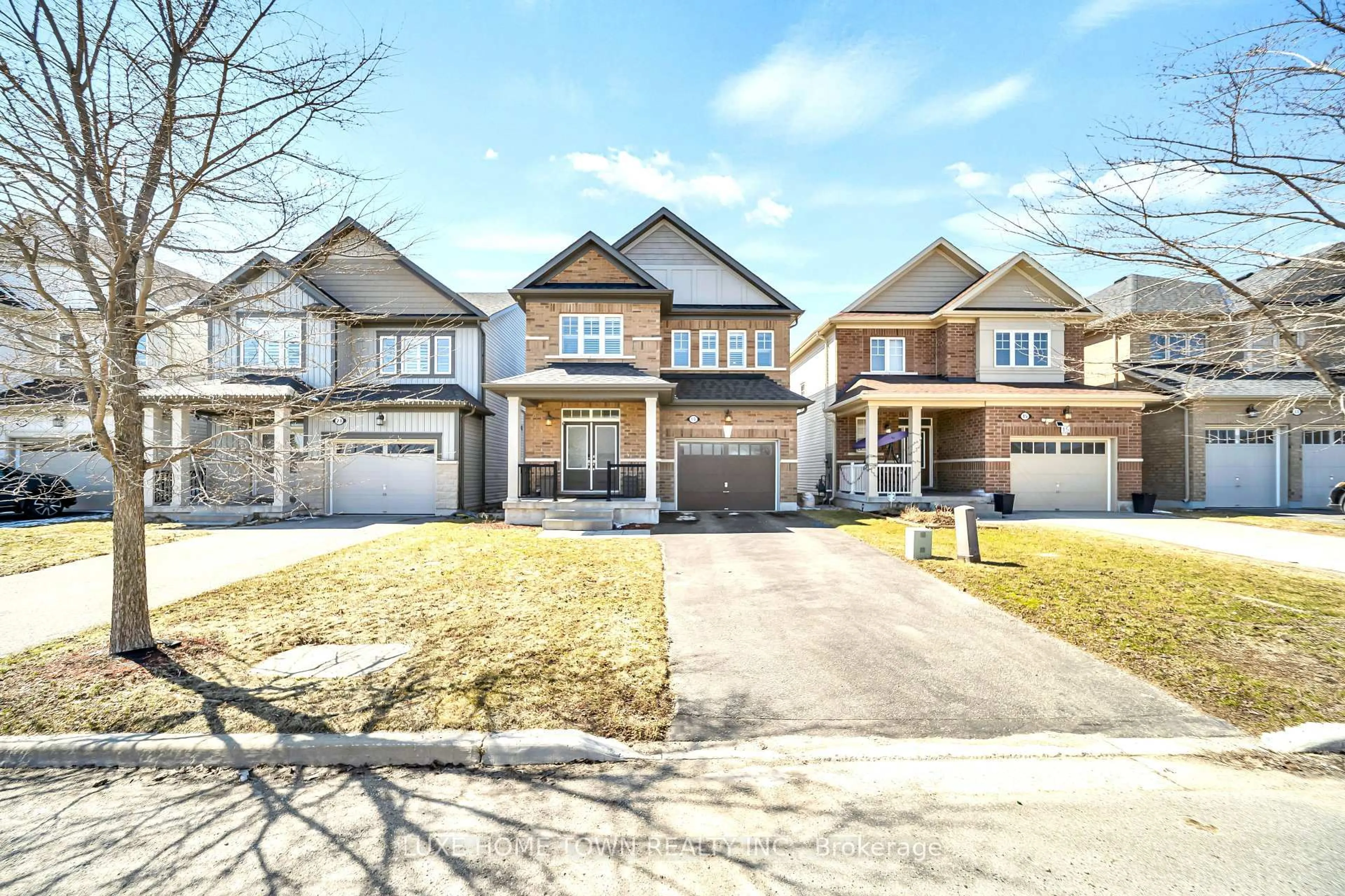 Home with brick exterior material, street for 19 Findlay Way, Centre Wellington Ontario N1M 0A4