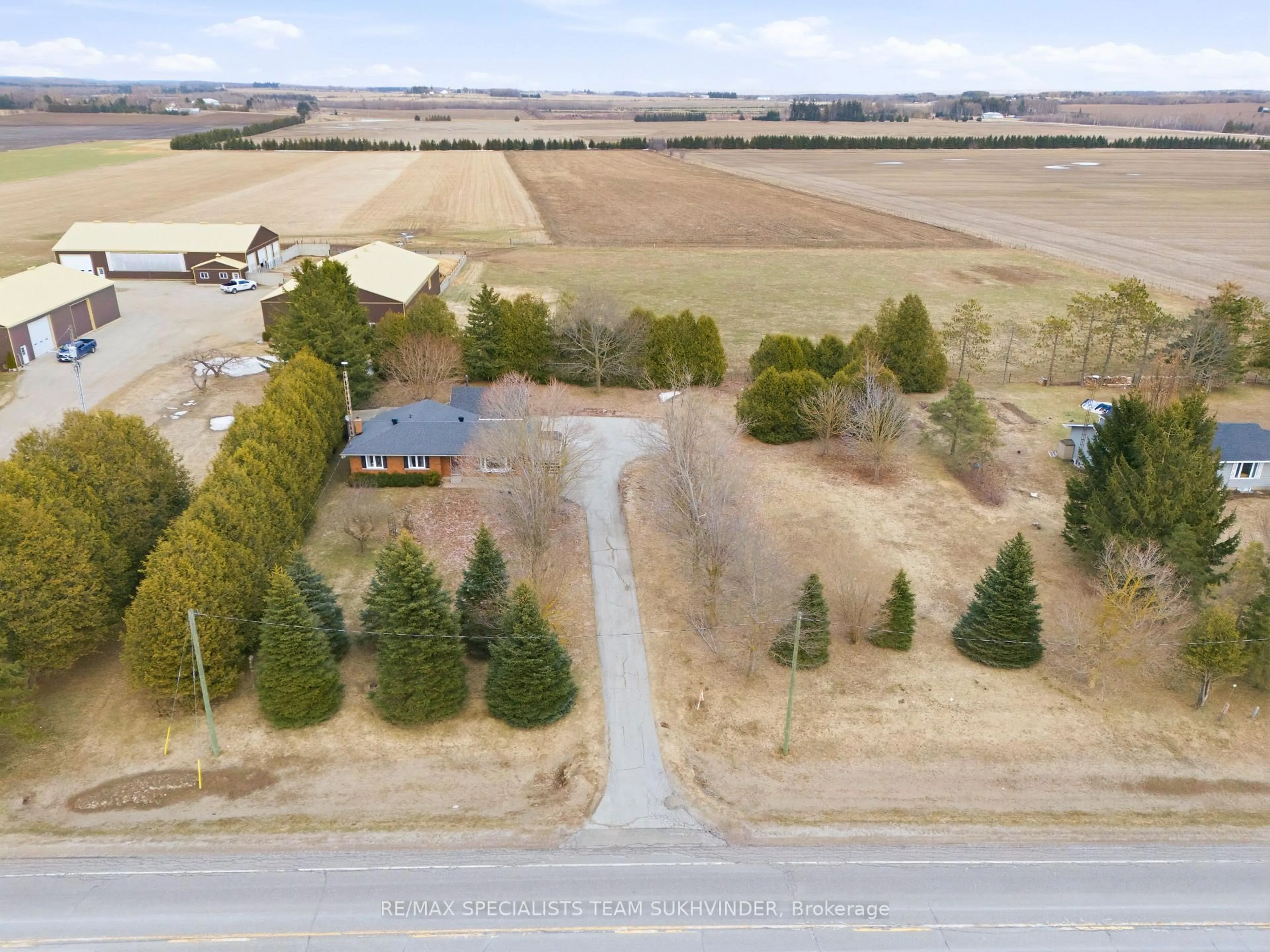A pic from outside/outdoor area/front of a property/back of a property/a pic from drone, unknown for 394073 County Road 12, Amaranth Ontario L9W 0N2