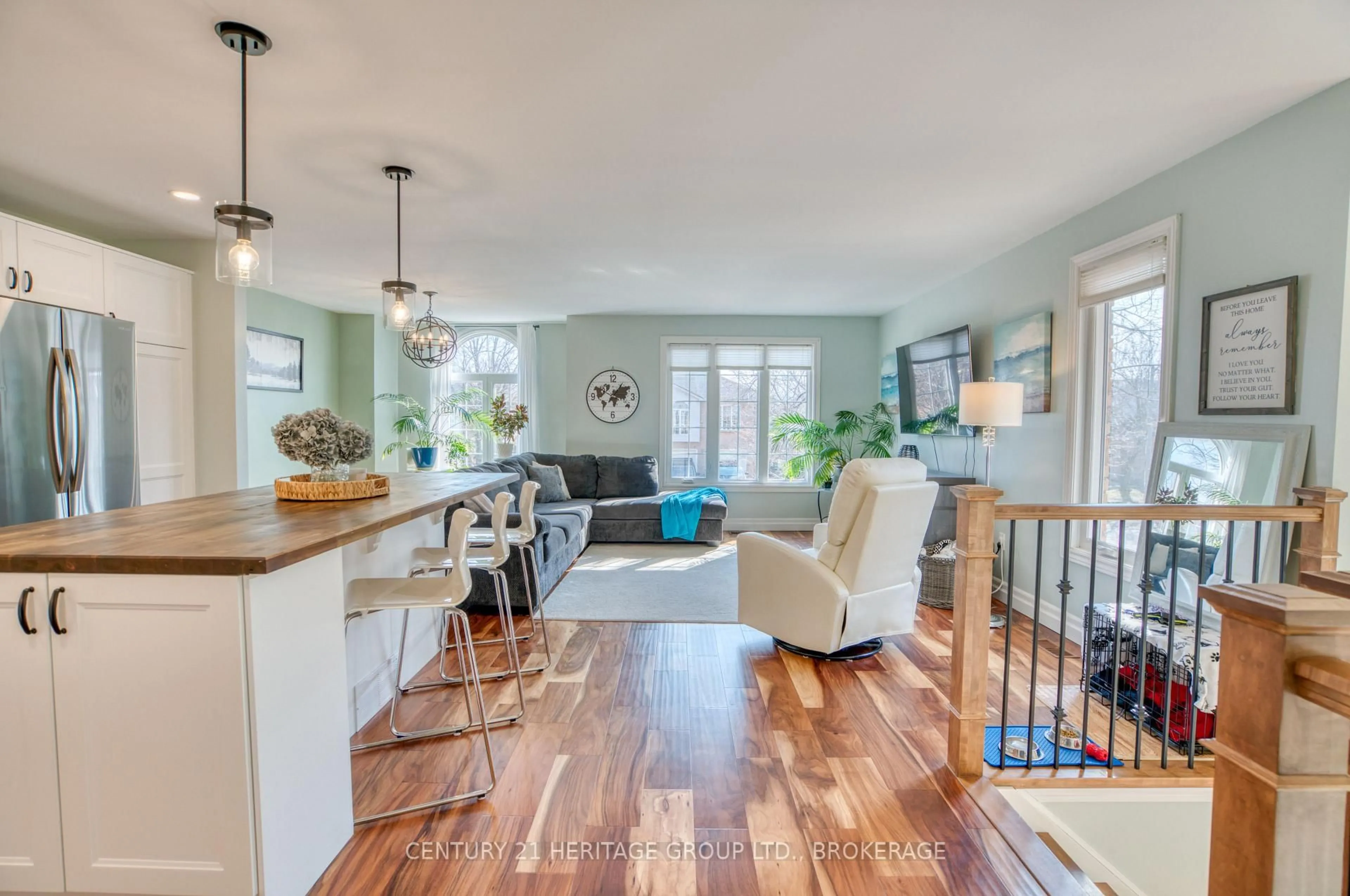 Open concept kitchen, wood/laminate floor for 654 Barnsley Cres, Kingston Ontario K7M 8X4