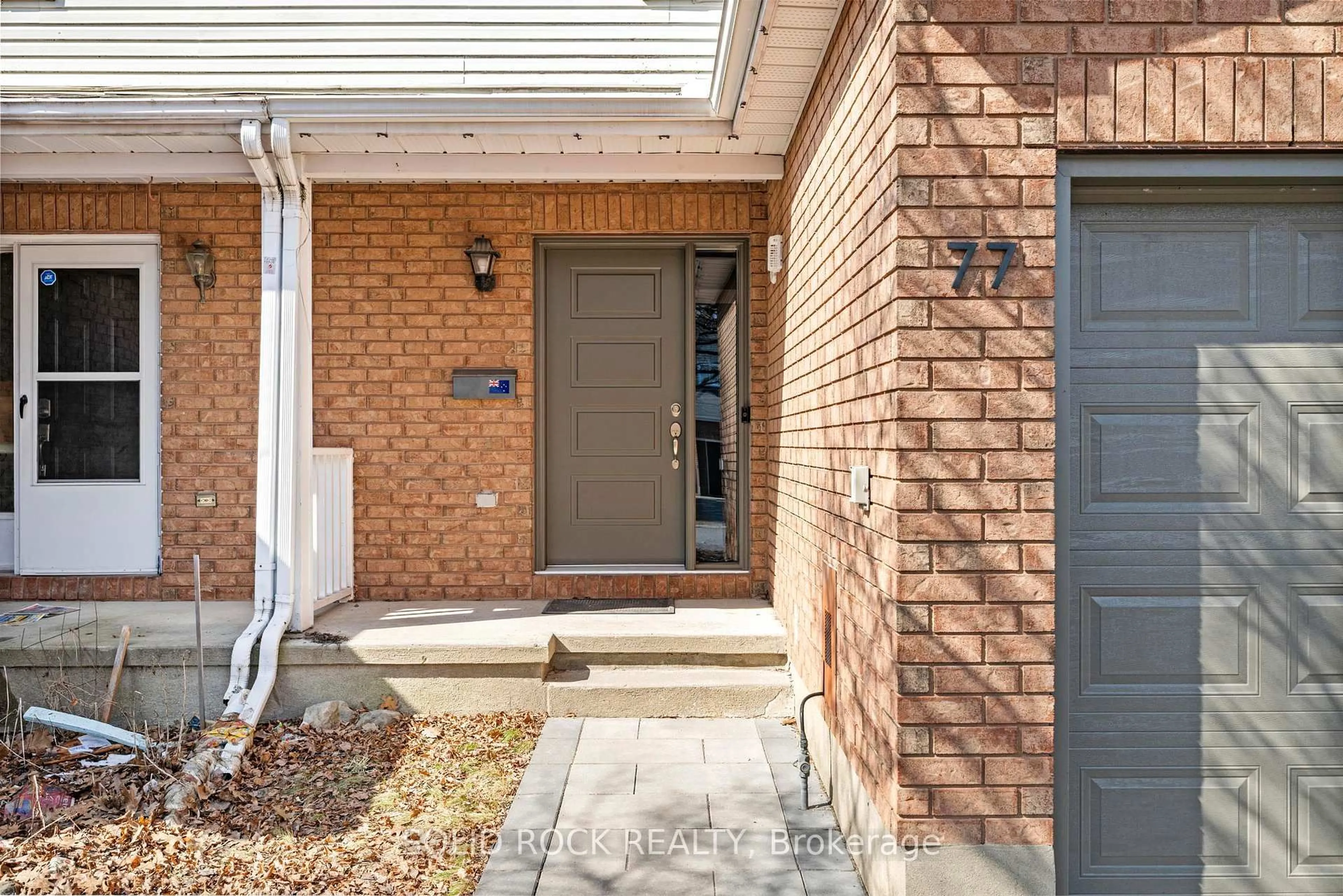 Home with brick exterior material, street for 77 Markland Cres, Ottawa Ontario K2G 5Z6
