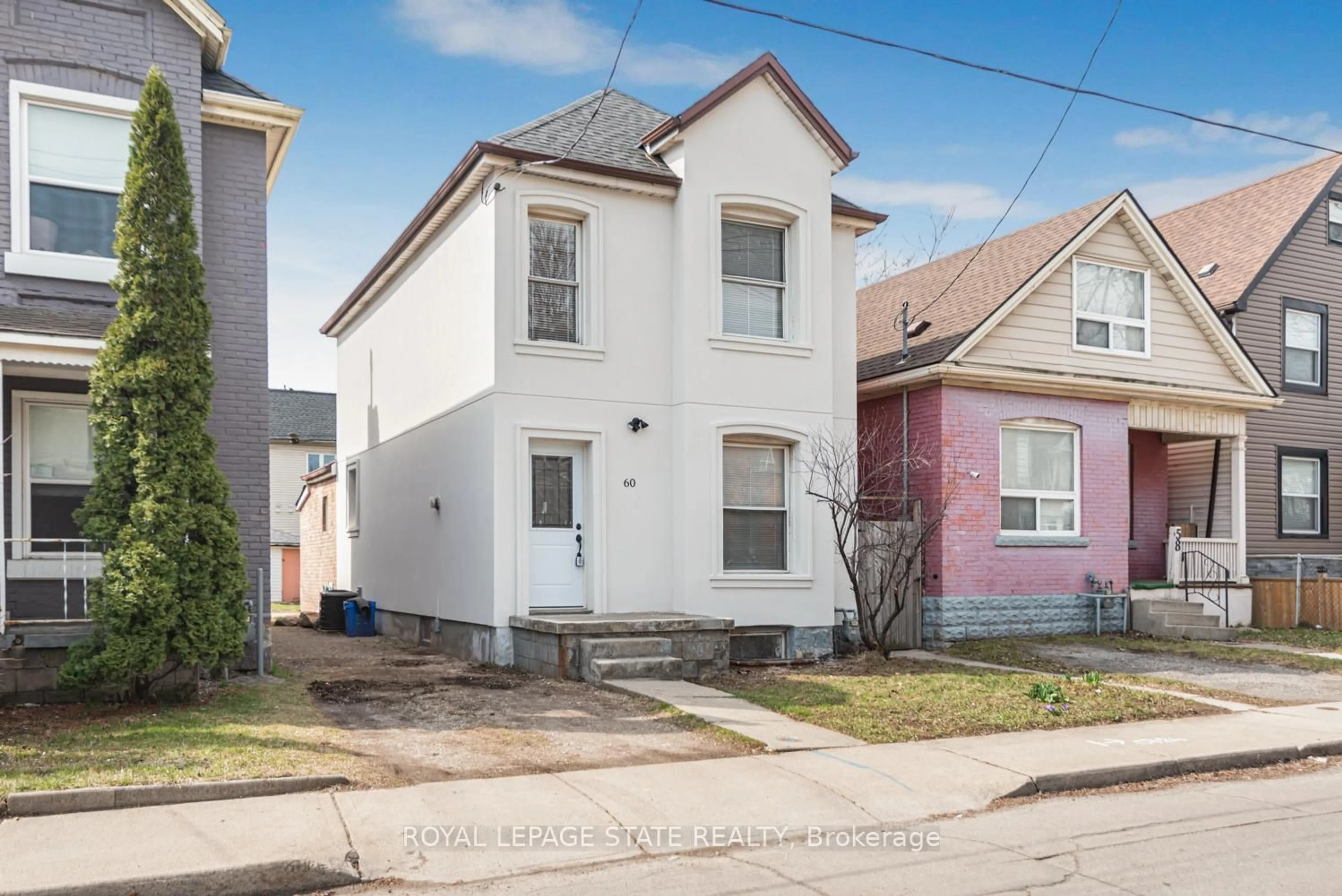 Home with brick exterior material, street for 60 Keith St, Hamilton Ontario L8L 3S3