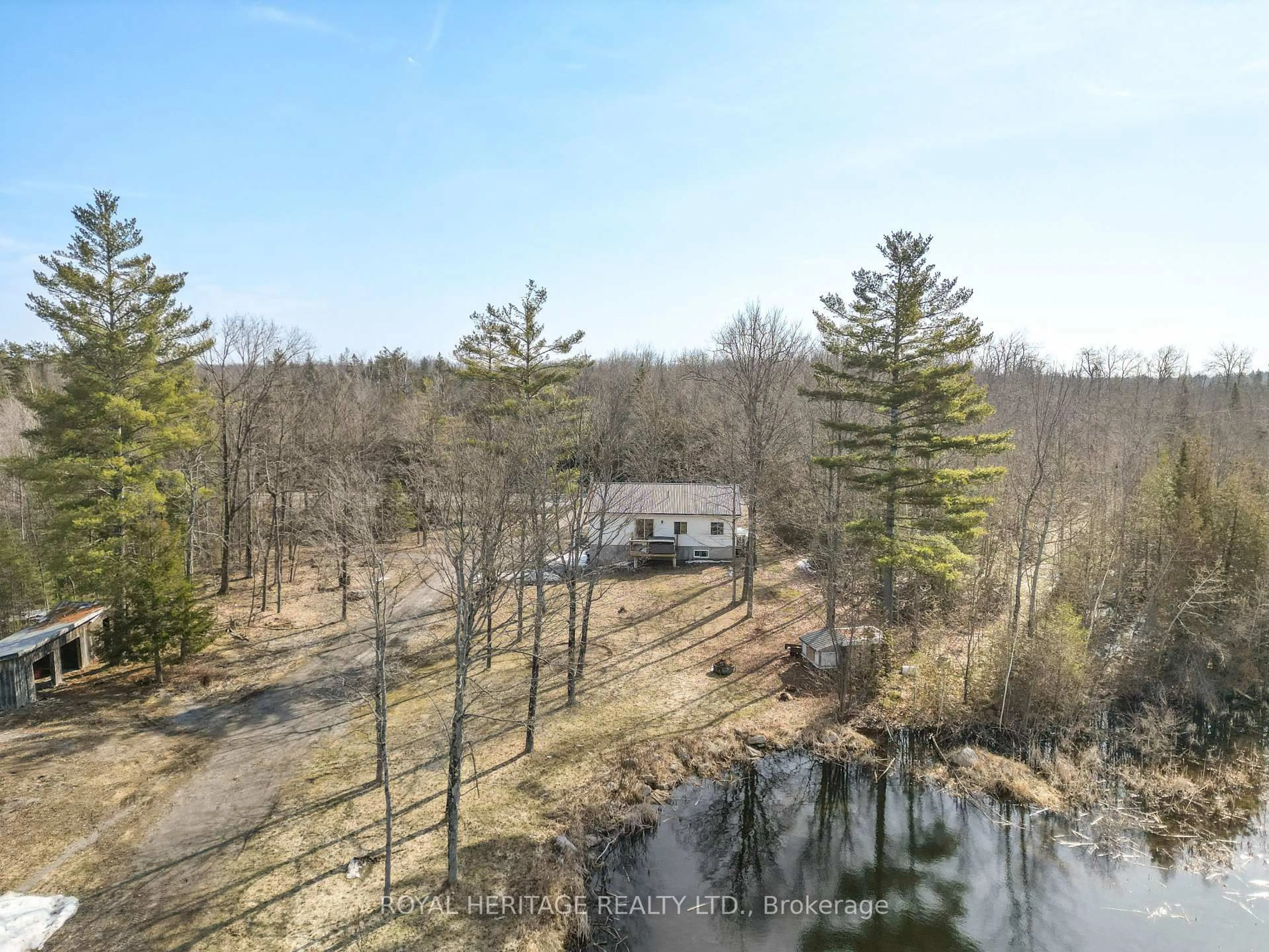 A pic from outside/outdoor area/front of a property/back of a property/a pic from drone, water/lake/river/ocean view for 1702 County Rd 40, Douro-Dummer Ontario K0L 2V0