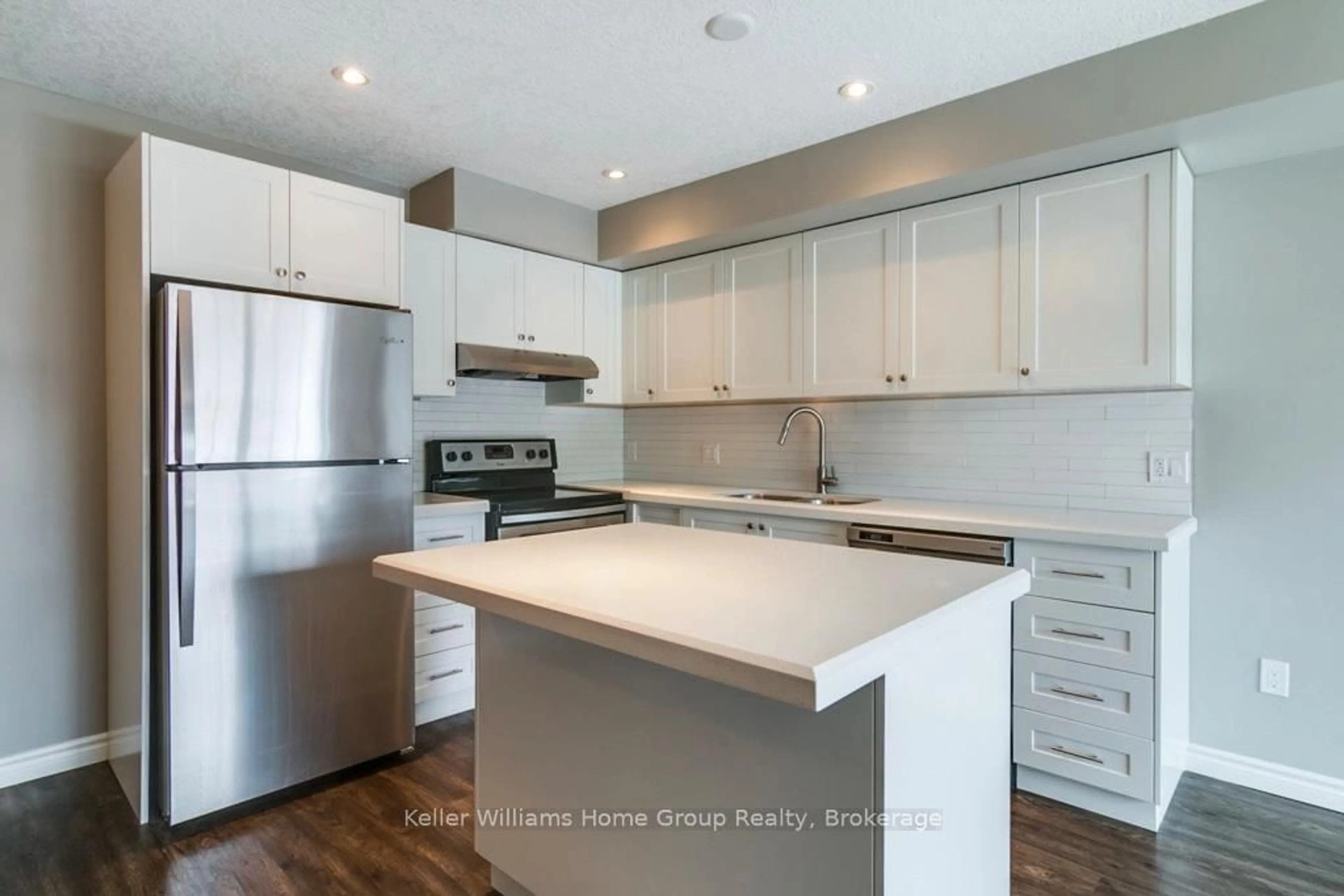 Open concept kitchen, wood/laminate floor for 75 Kehl St #15, Kitchener Ontario N2M 3V1