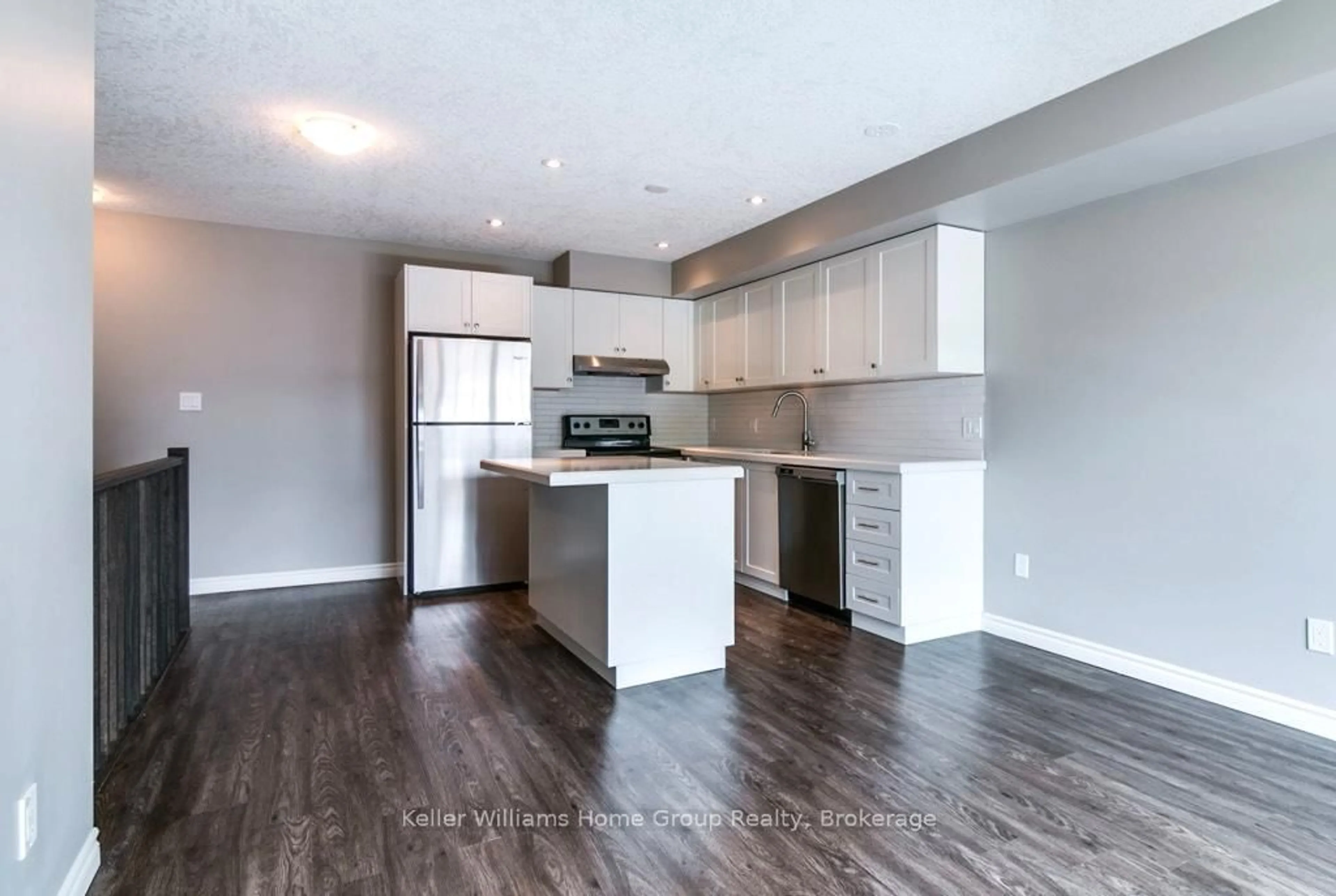 Open concept kitchen, wood/laminate floor for 75 Kehl St #15, Kitchener Ontario N2M 3V1