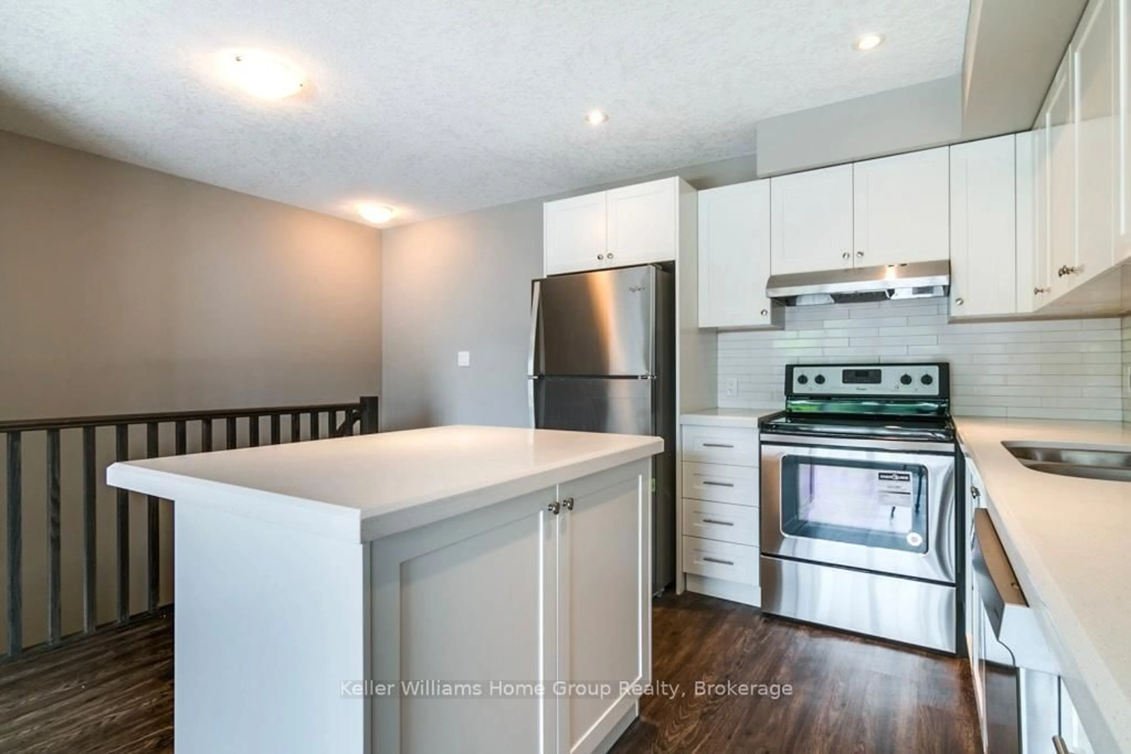 Open concept kitchen, wood/laminate floor for 75 Kehl St #15, Kitchener Ontario N2M 3V1