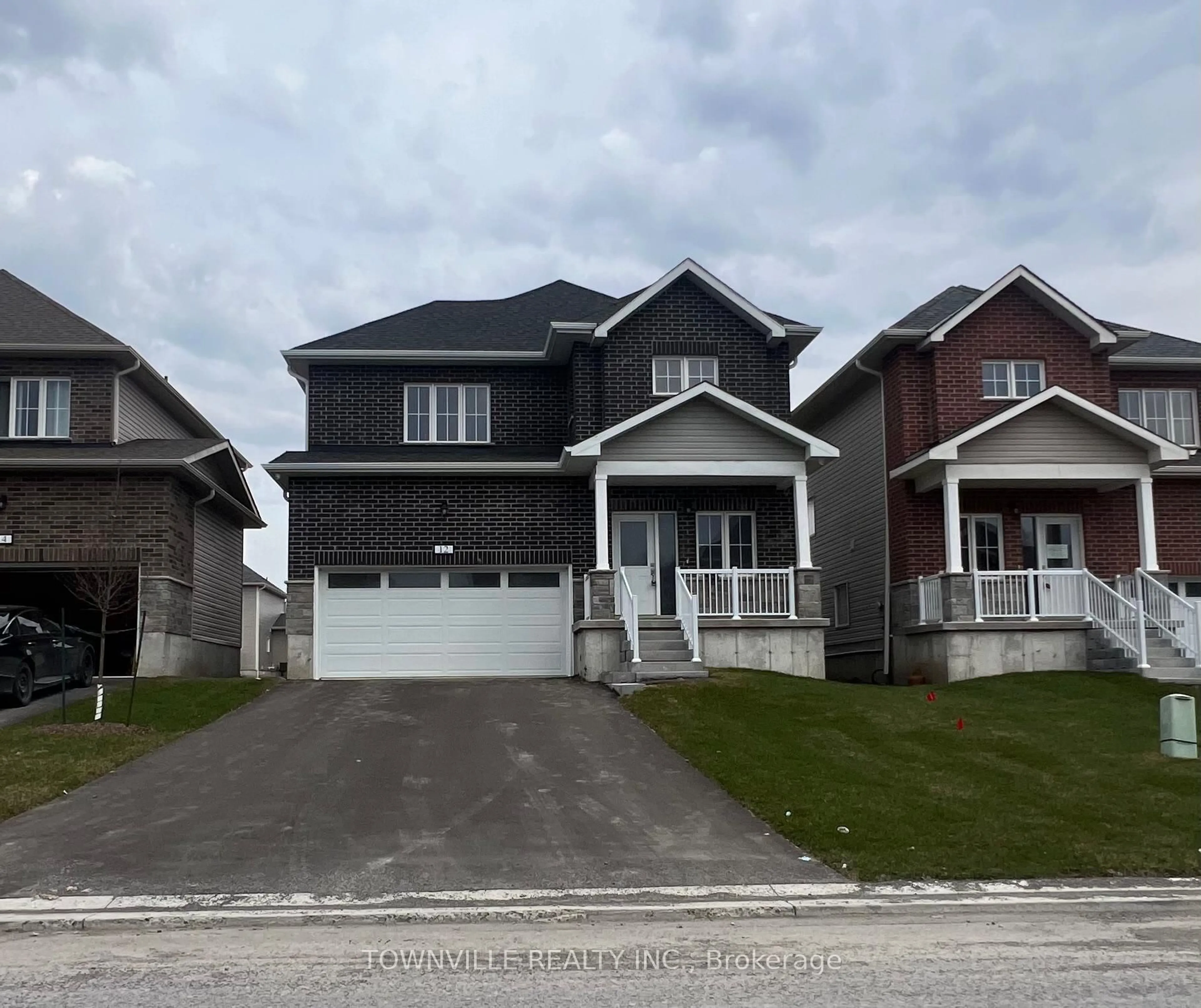 Home with vinyl exterior material, street for 12 Bradden Cres, Belleville Ontario K8N 0T8