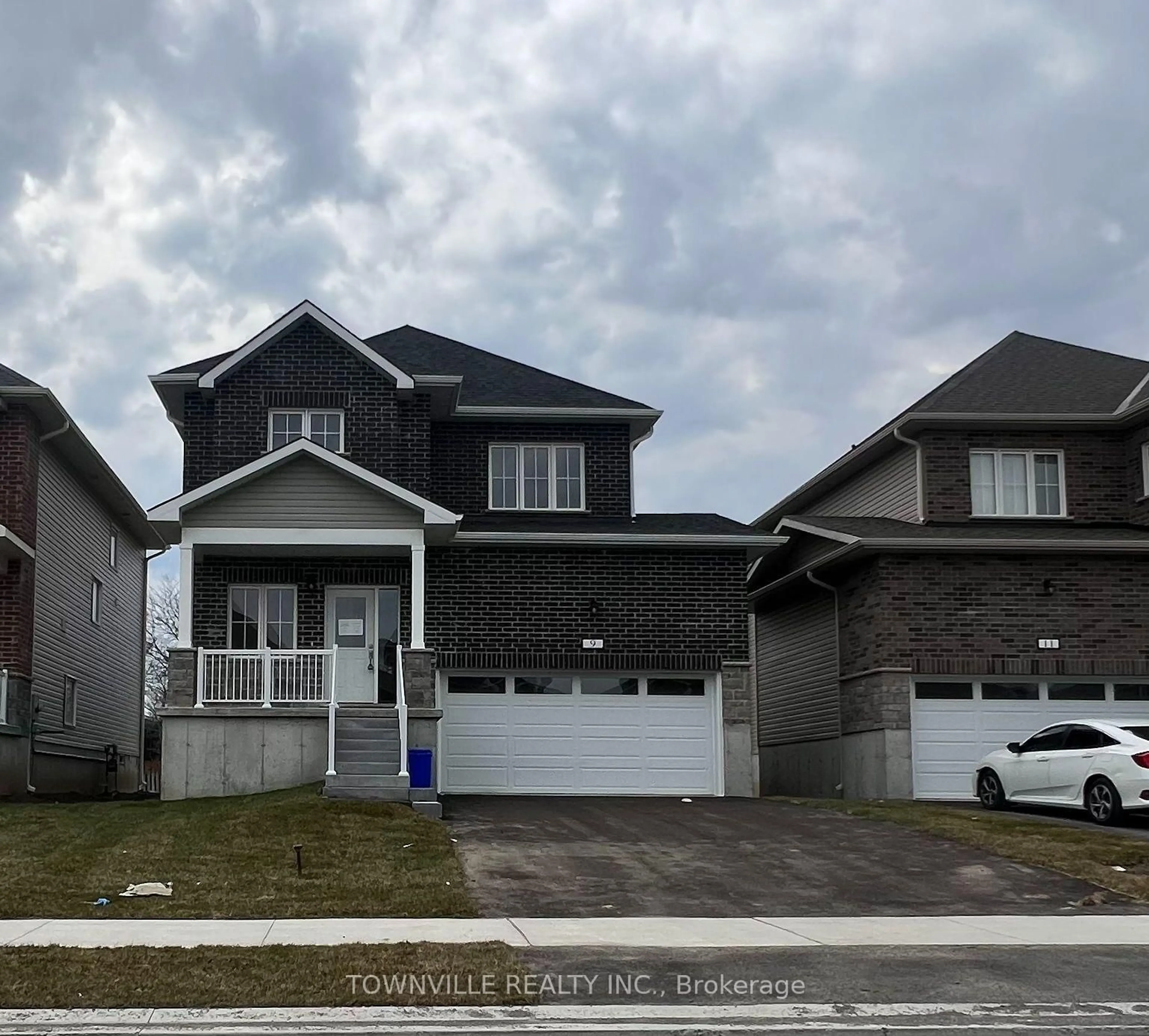 Home with vinyl exterior material, street for 9 Bradden Cres, Belleville Ontario K8N 0T8