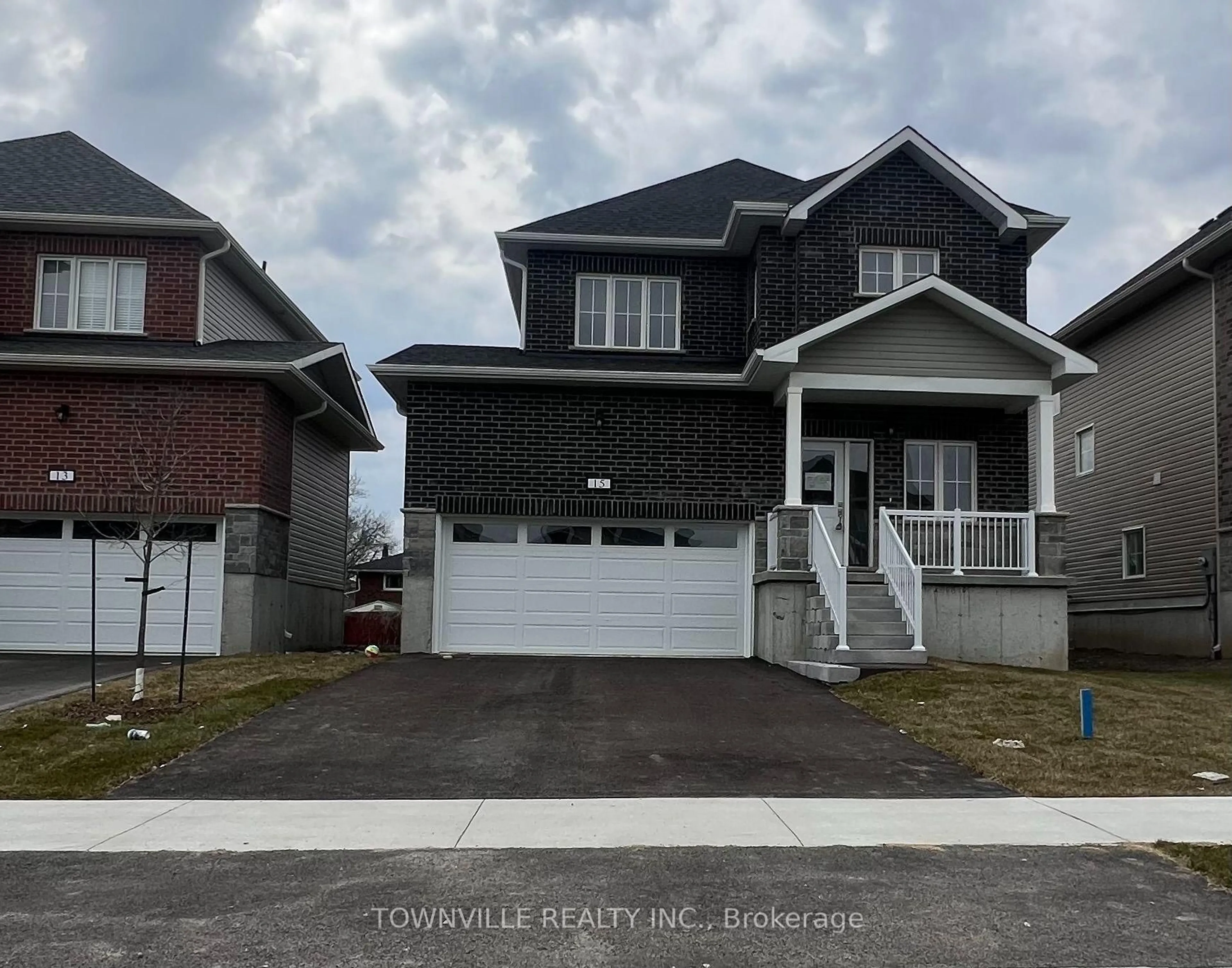 Home with vinyl exterior material, street for 15 Bradden Cres, Belleville Ontario K8N 0T8