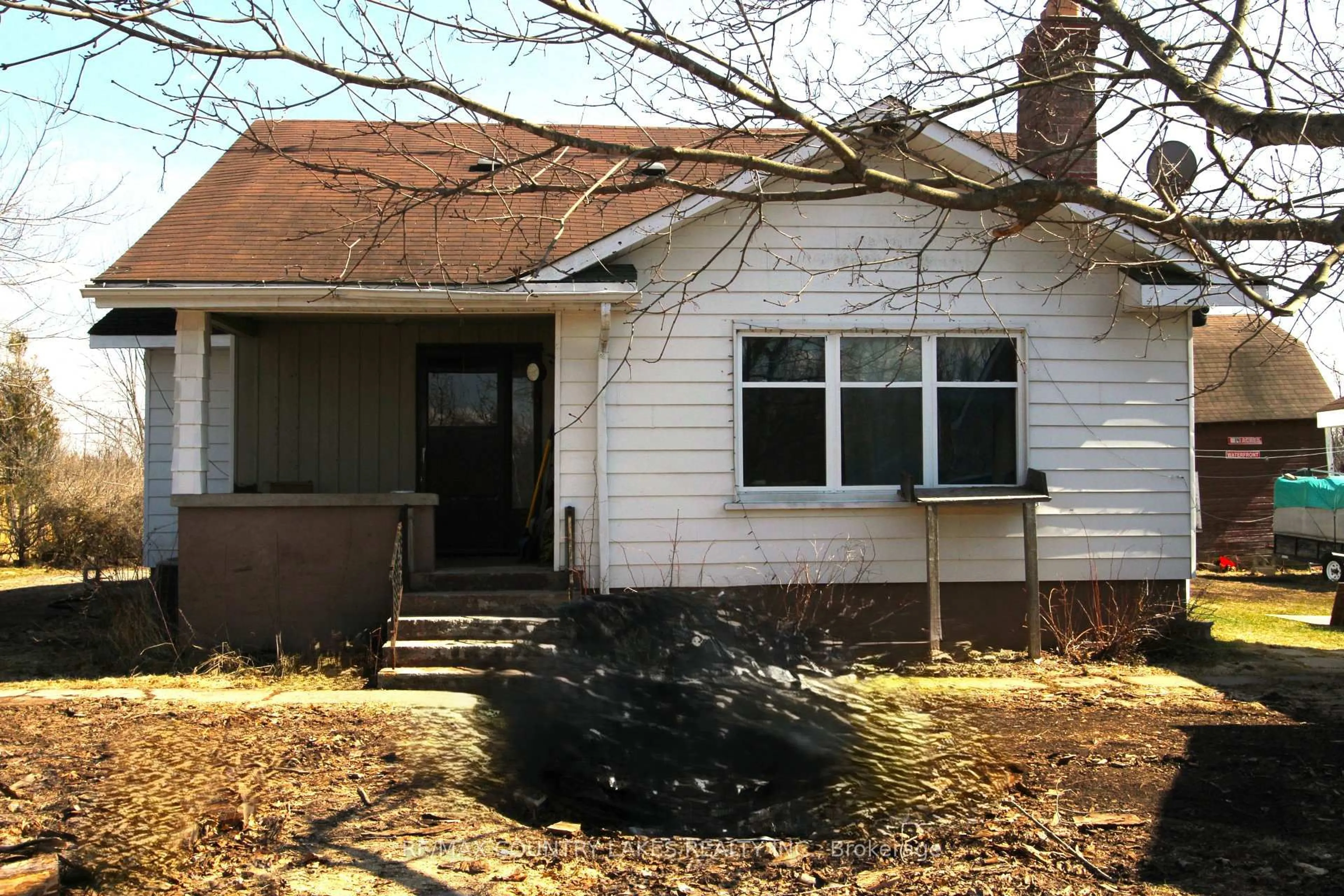 Home with vinyl exterior material, street for 21 Richmond St, Kawartha Lakes Ontario K0M 2B0