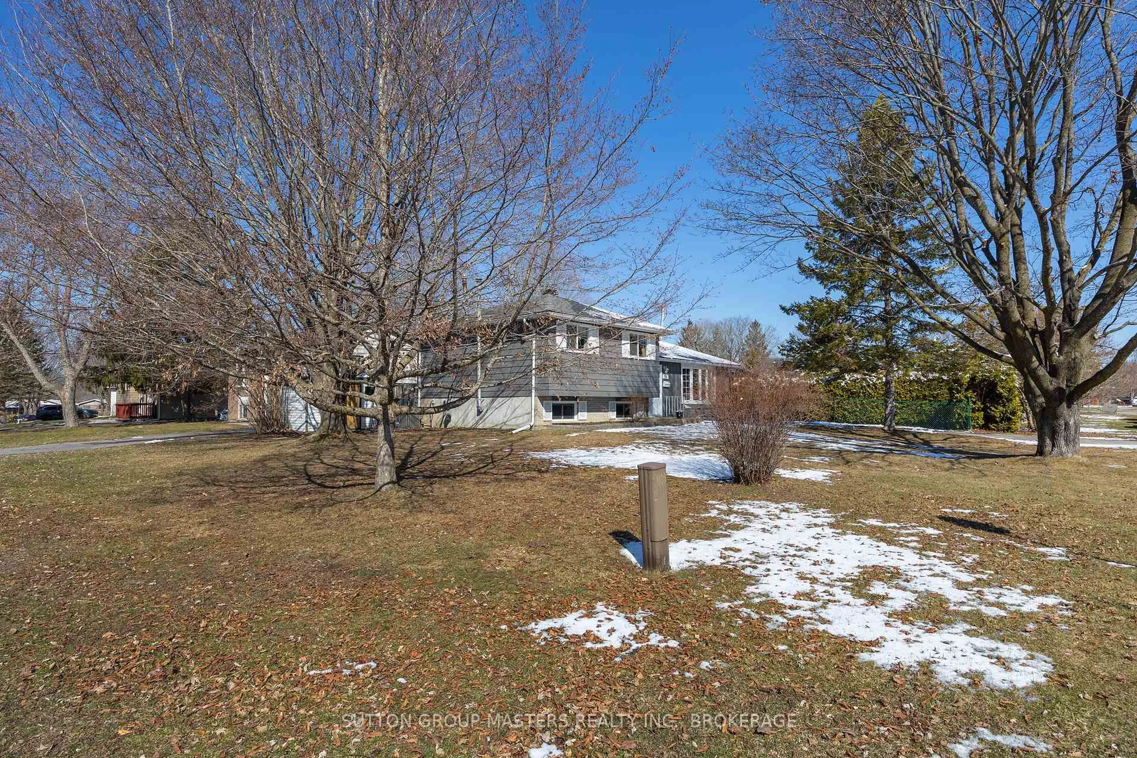 A pic from outside/outdoor area/front of a property/back of a property/a pic from drone, water/lake/river/ocean view for 745 Louis St, Kingston Ontario K7M 6M7