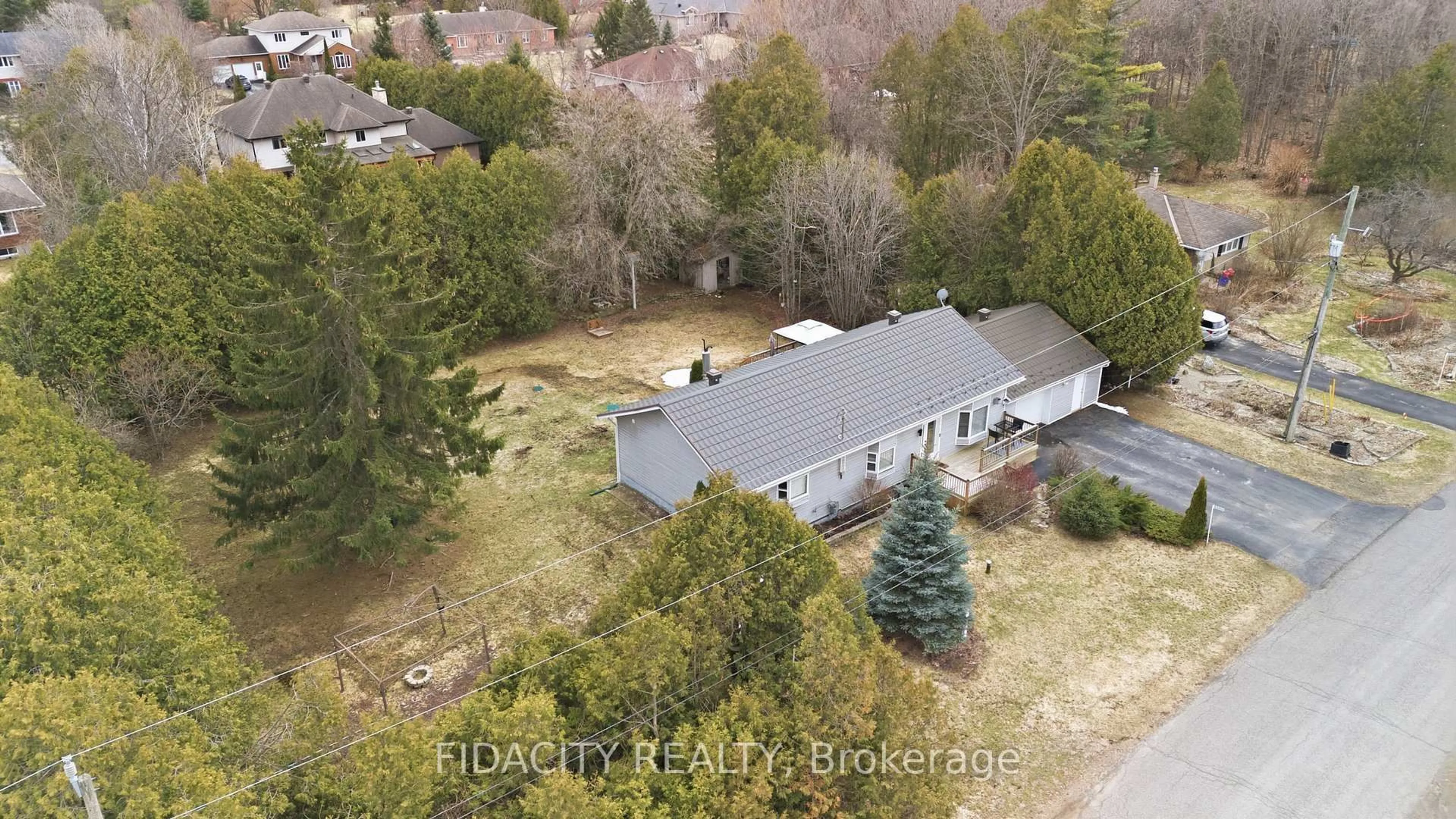 A pic from outside/outdoor area/front of a property/back of a property/a pic from drone, water/lake/river/ocean view for 6560 Jack Pine Cres, Greely Ontario K4P 1E1